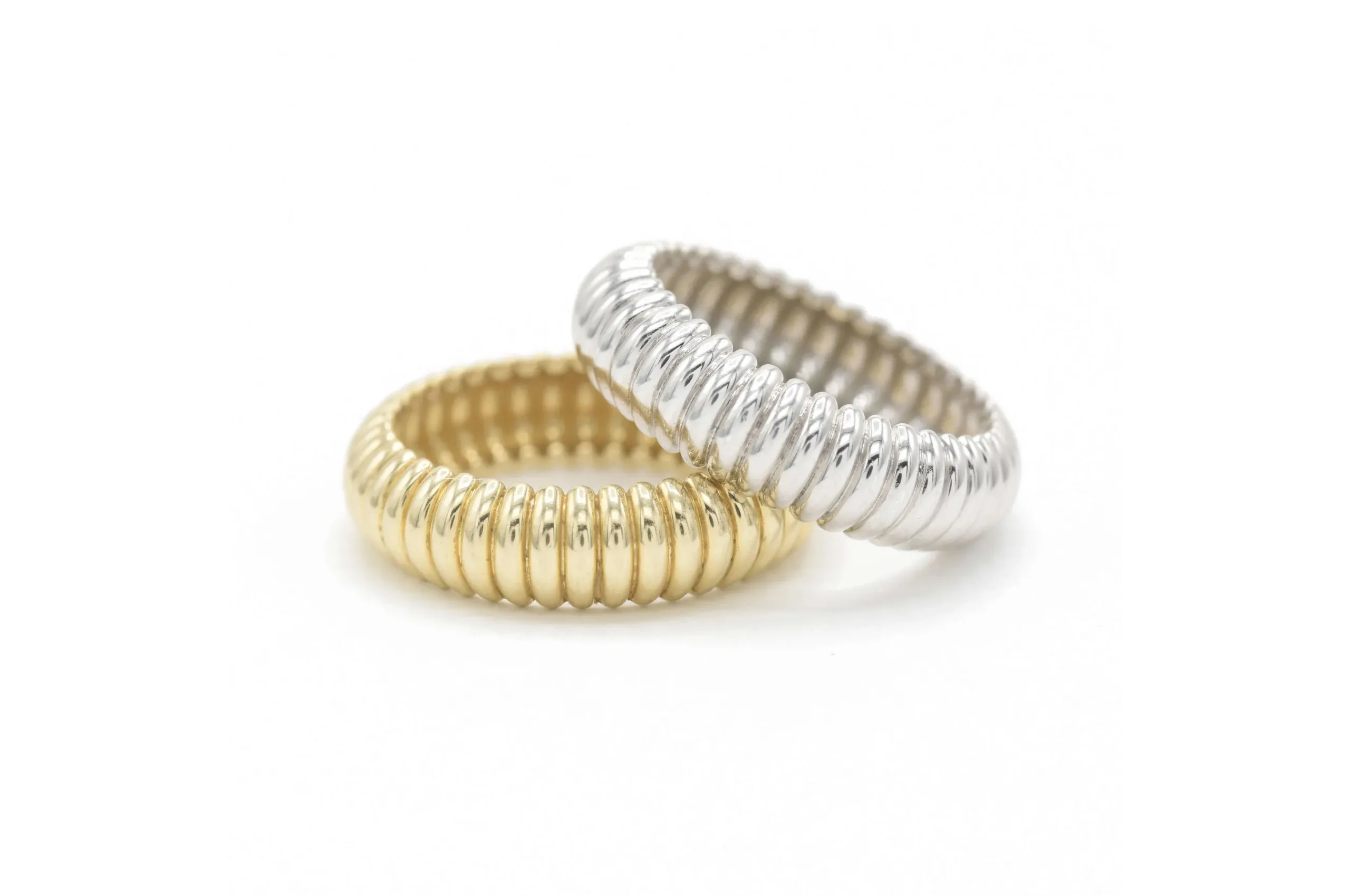 <p>A twist on a classic band-style promise ring: Bondeye puff rings in 14K yellow or white gold.</p>