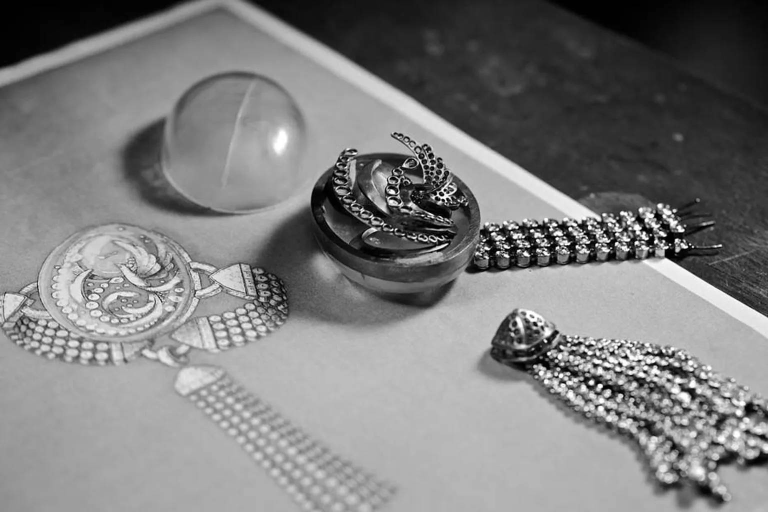 <p>The different elements that make up Boucheron&#8217;s unique Cristal de Lune jewellery watch, pictured beside the original sketch</p>
