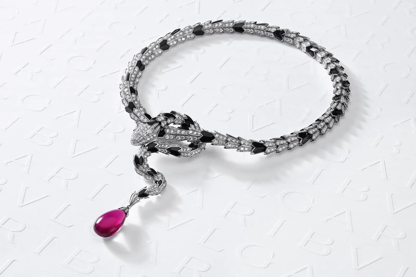 <p>Model Lily Cole wears the Serpenti Metamorphosis High Jewellery necklace with a 21 carat rubellite drop from the Bulgari Magnifica collection</p>