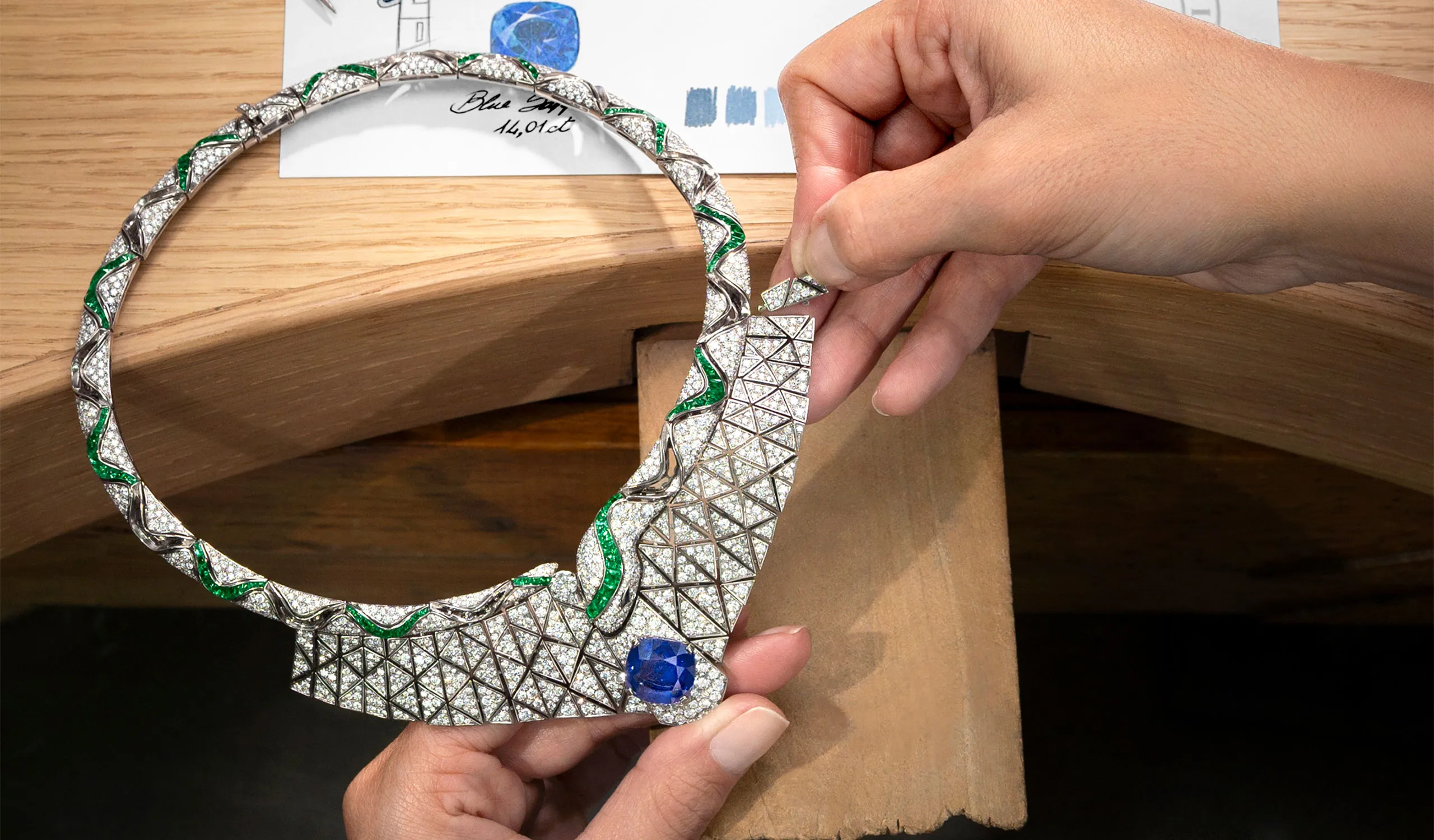 <p>The design plays with perception, with the snake only revealing itself on closer inspection as the geometry gives way to a recognisable silhouette</p>
