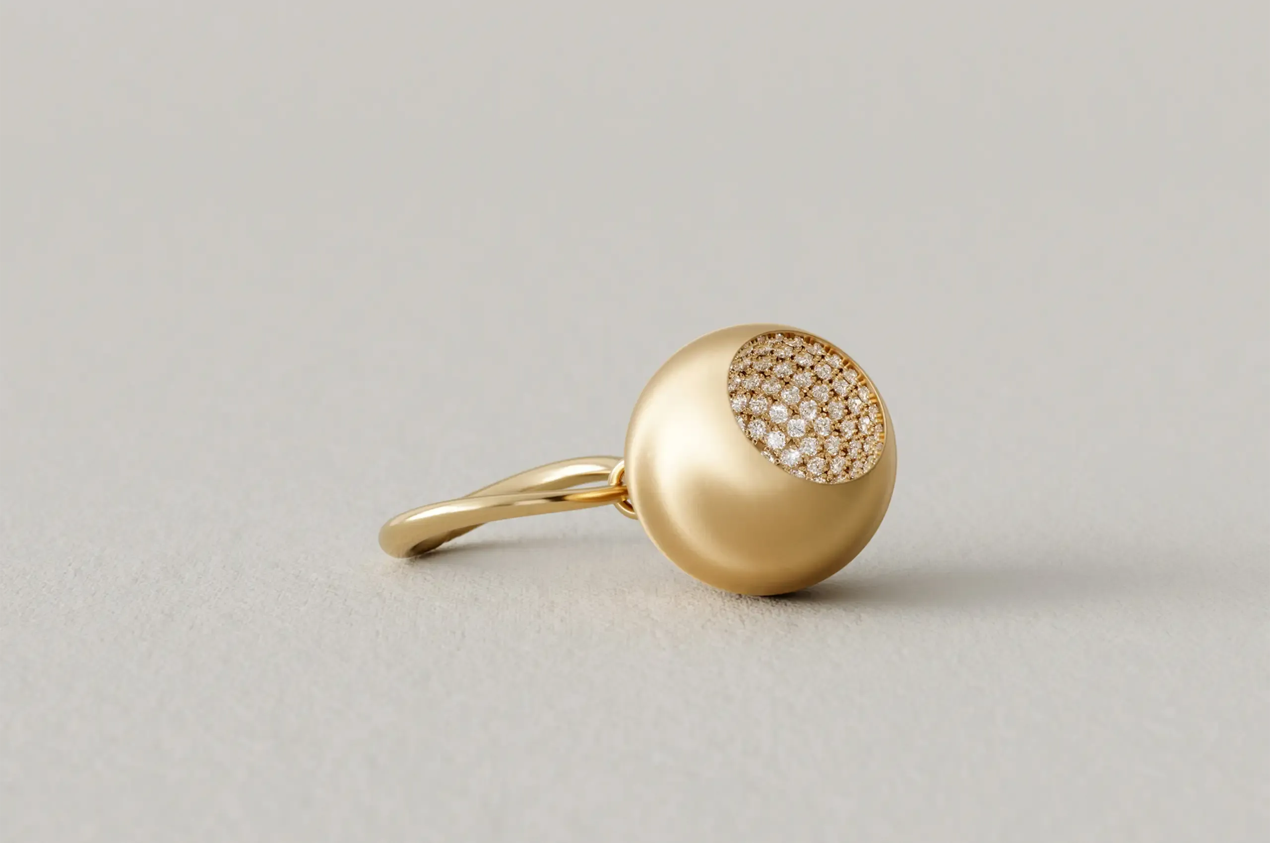 CAVE Round Large Charm Ring in 18k yellow gold and diamonds.