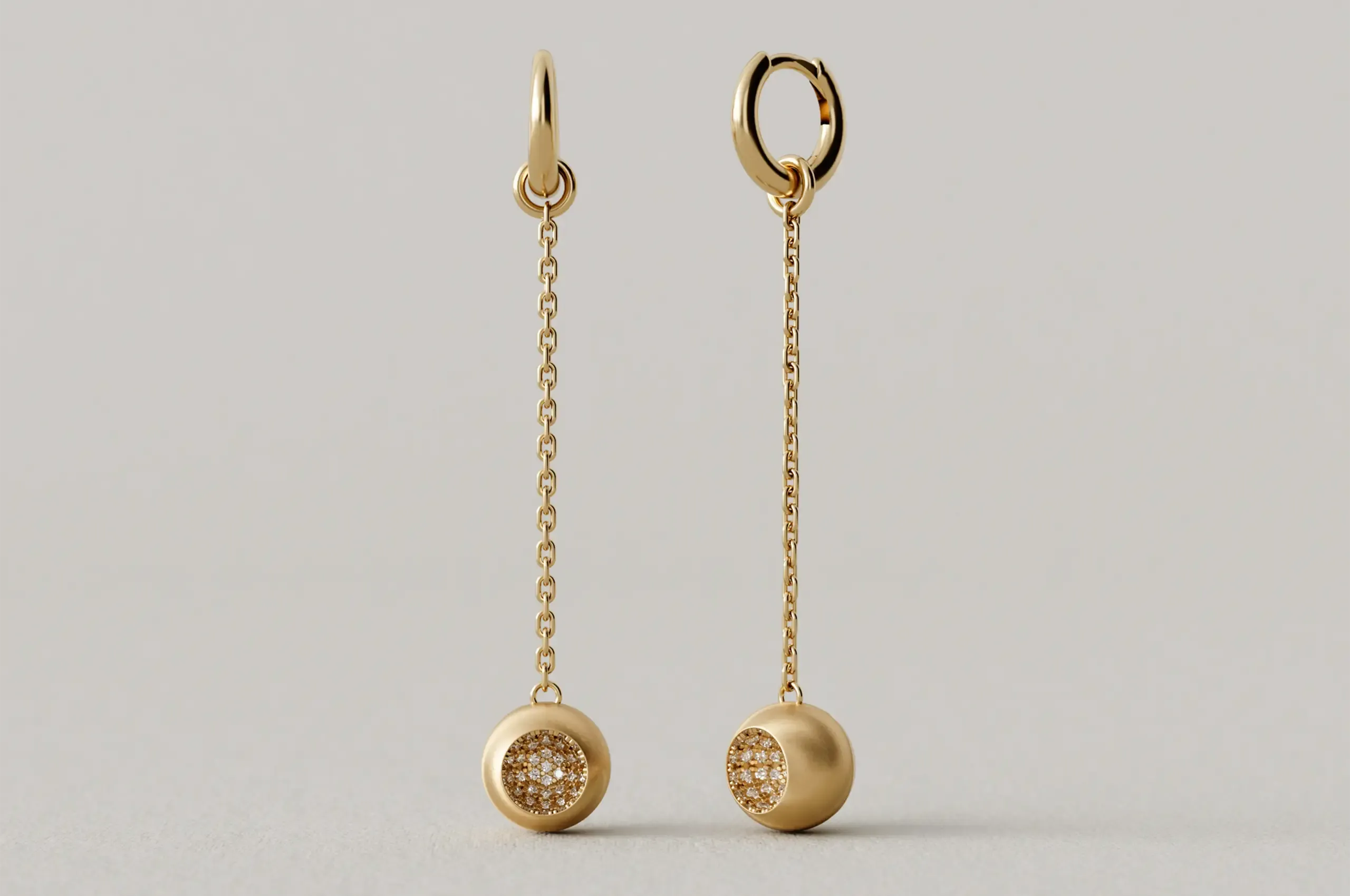 CAVE Round 80mm Drop Earrings in 18k yellow gold and diamonds.