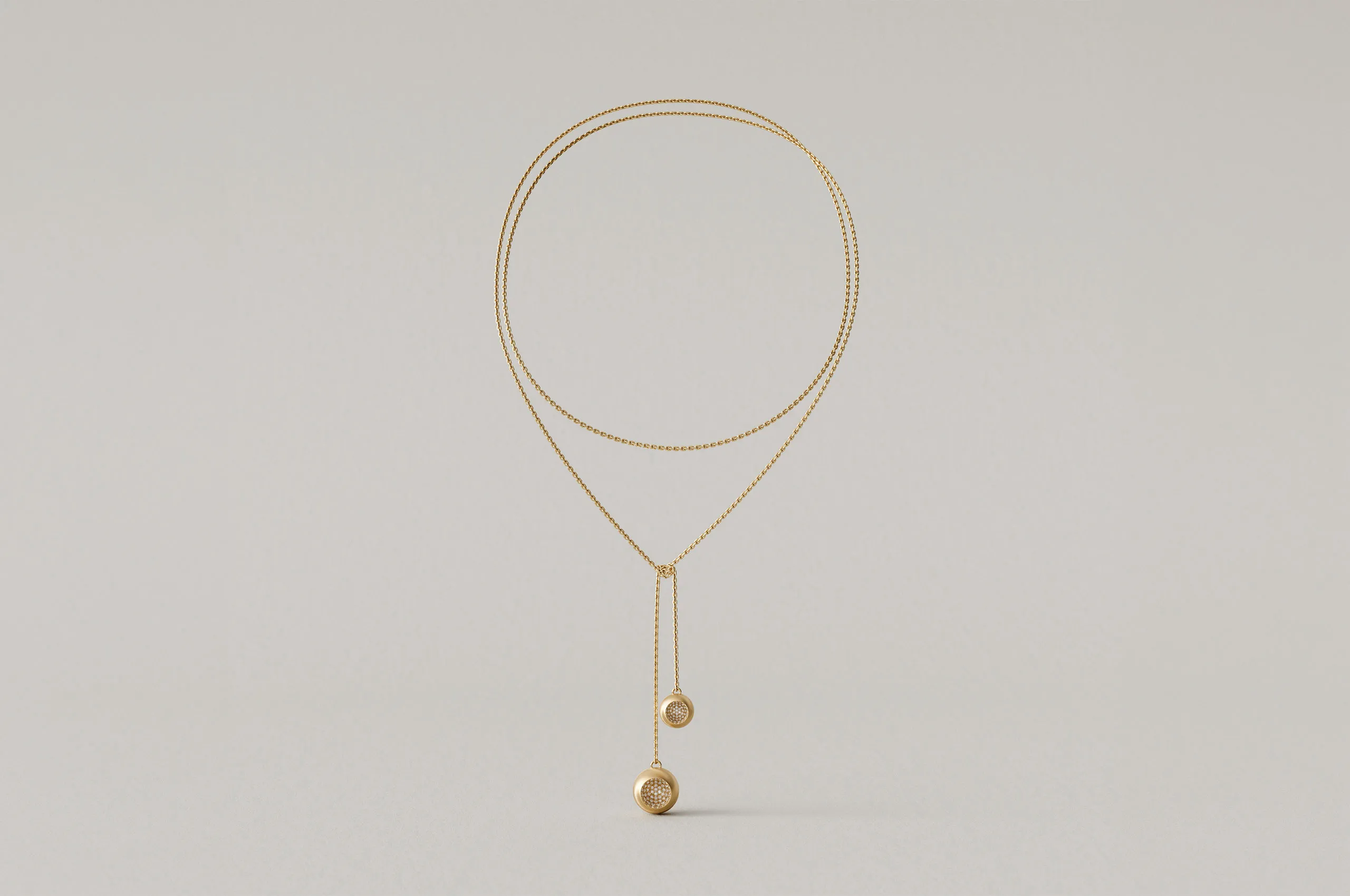 CAVE Round Lariat Necklace in 18k yellow gold and diamonds.