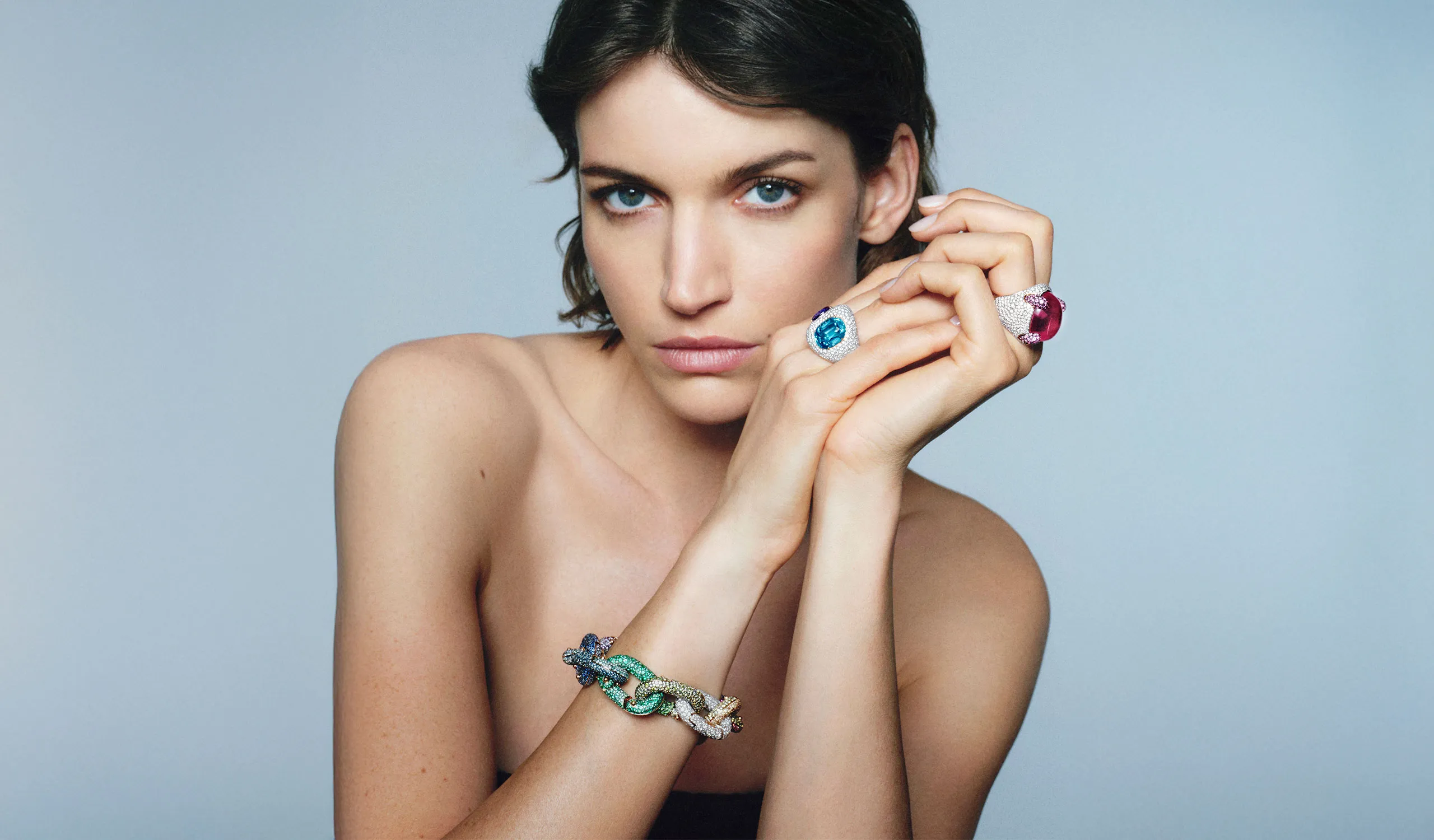 <p>A model wears the Pomellato Rainbow bracelet, a Marvelous Griffe ring and a Duetto cocktail ring from the ‘Collezione 1967’ High Jewellery collection</p>