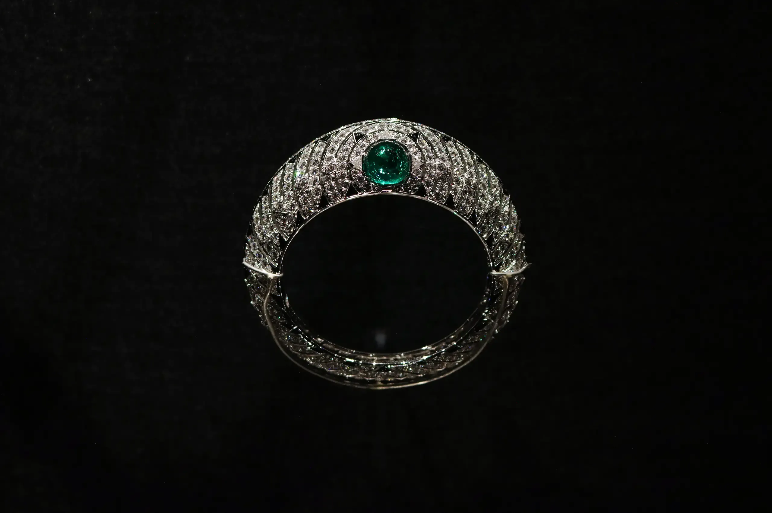 Cartier bracelet, 2014, set with a 53.78-carat emerald and diamonds in platinum. Cartier Collection