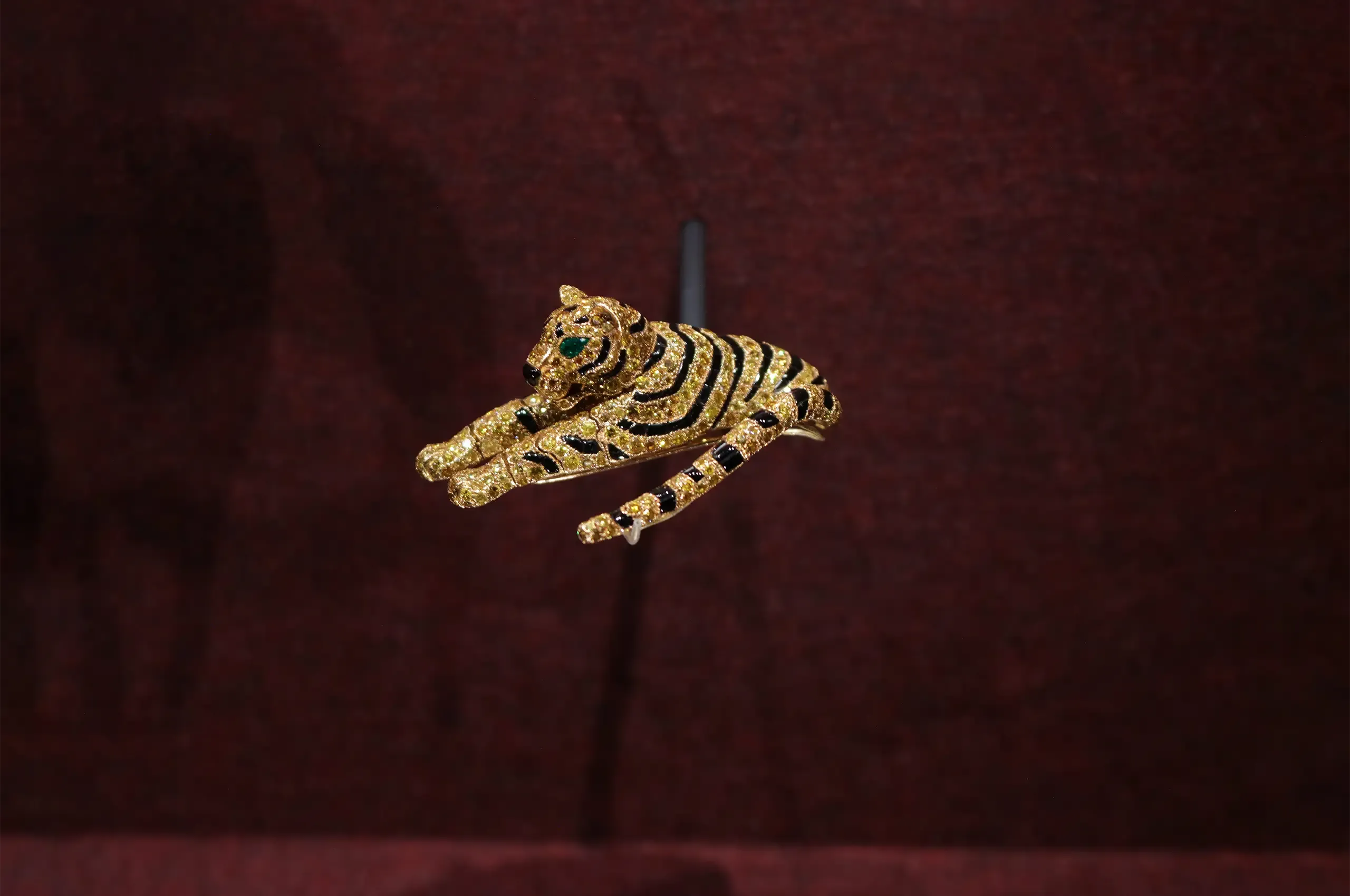 Cartier Tiger clip brooch, 1959, formerly owned by the Duchess of Windsor, set with yellow and colourless diamonds, onyx and emeralds