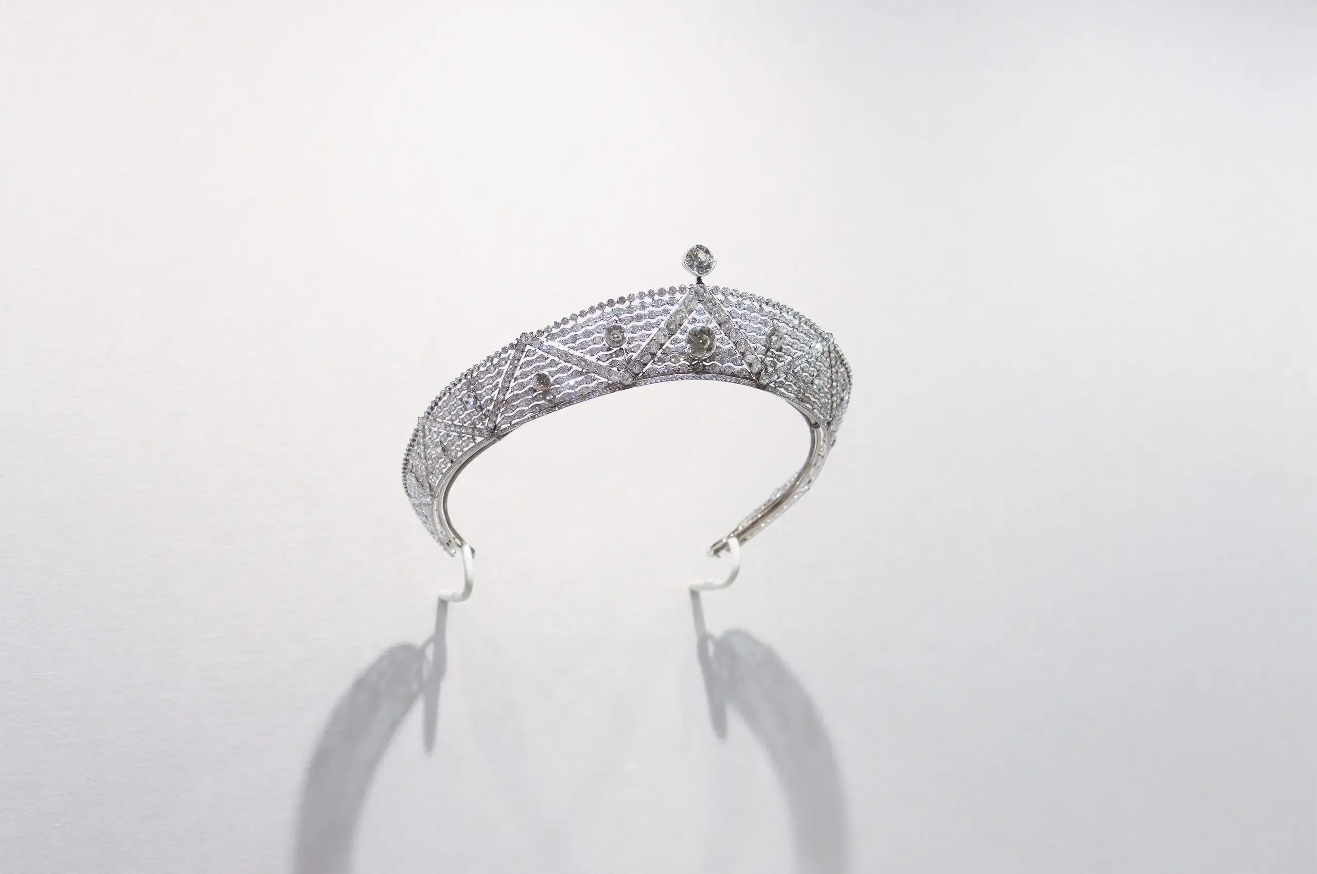 Cartier ‘Oriental’ bandeau, 1911, in platinum and diamonds, its openwork geometric design inspired by Islamic art and architecture. Cartier Collection