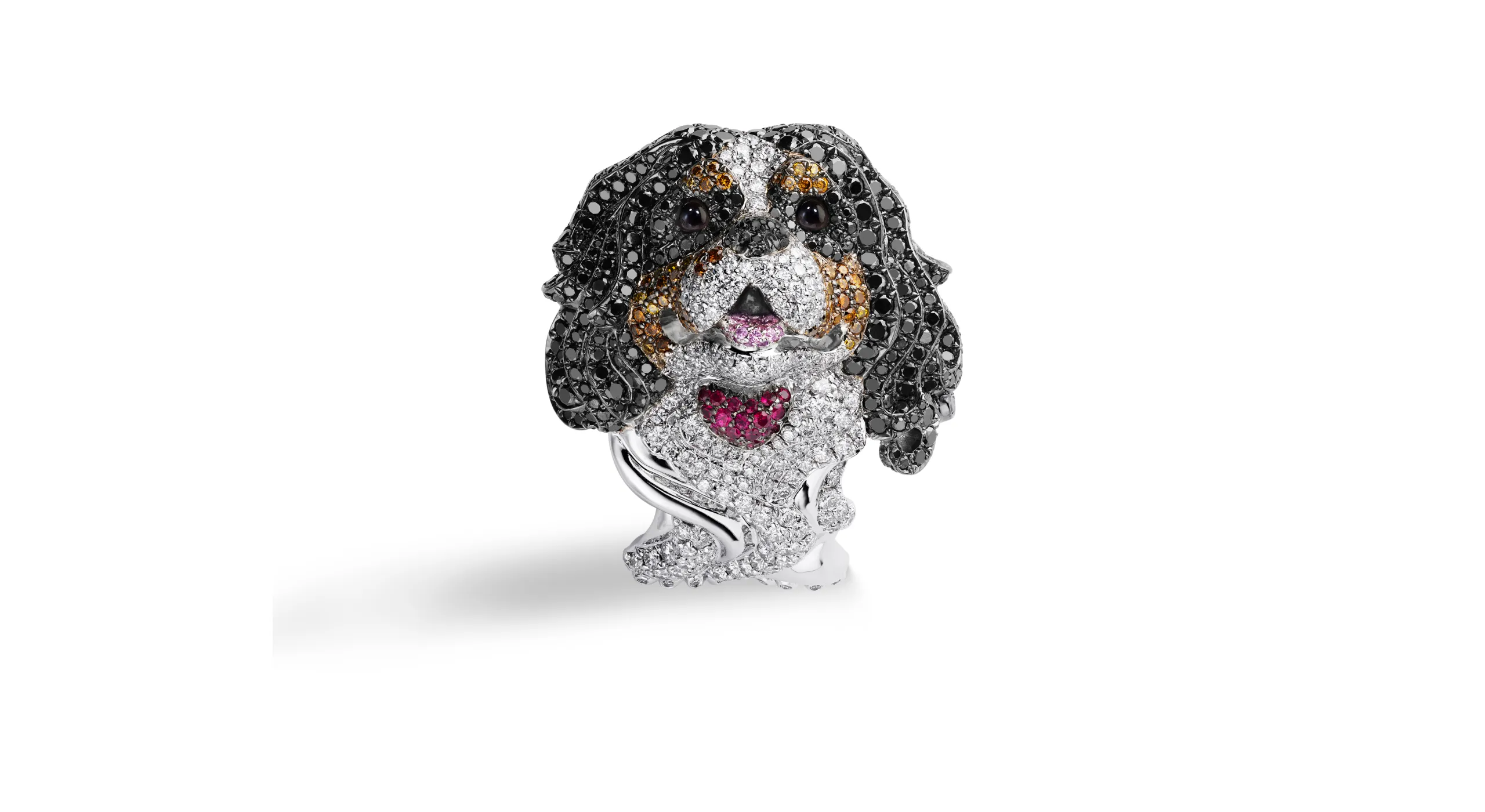 <p>Chopard ‘Byron’ the Cavalier King Charles ring paved with white, black and cognac diamonds totalling 6.37 carats, plus rubies, pink sapphires and onyx cabochons set in 18k rose gold, part of the Caroline&#8217;s Universe Red Carpet High Jewellery Collection 2025</p>
