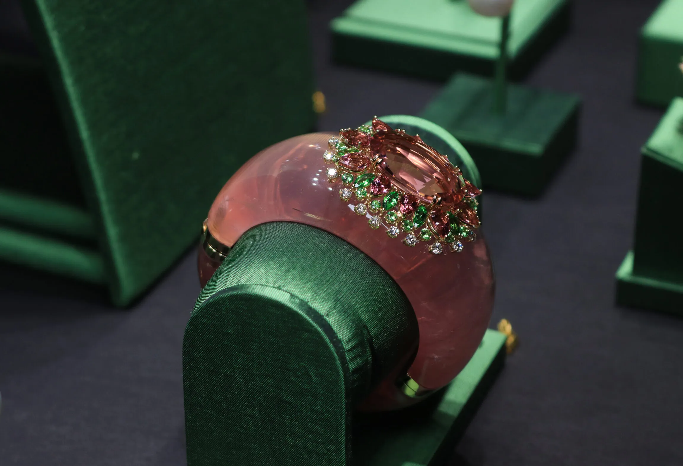 <p>Margot McKinney Coral Cay cuff crafted from 1,097.75 carats of rose quartz and 18k yellow gold, set with a 43.04 carat pink tourmaline, diamonds, further pink tourmalines and tsavorites</p>
