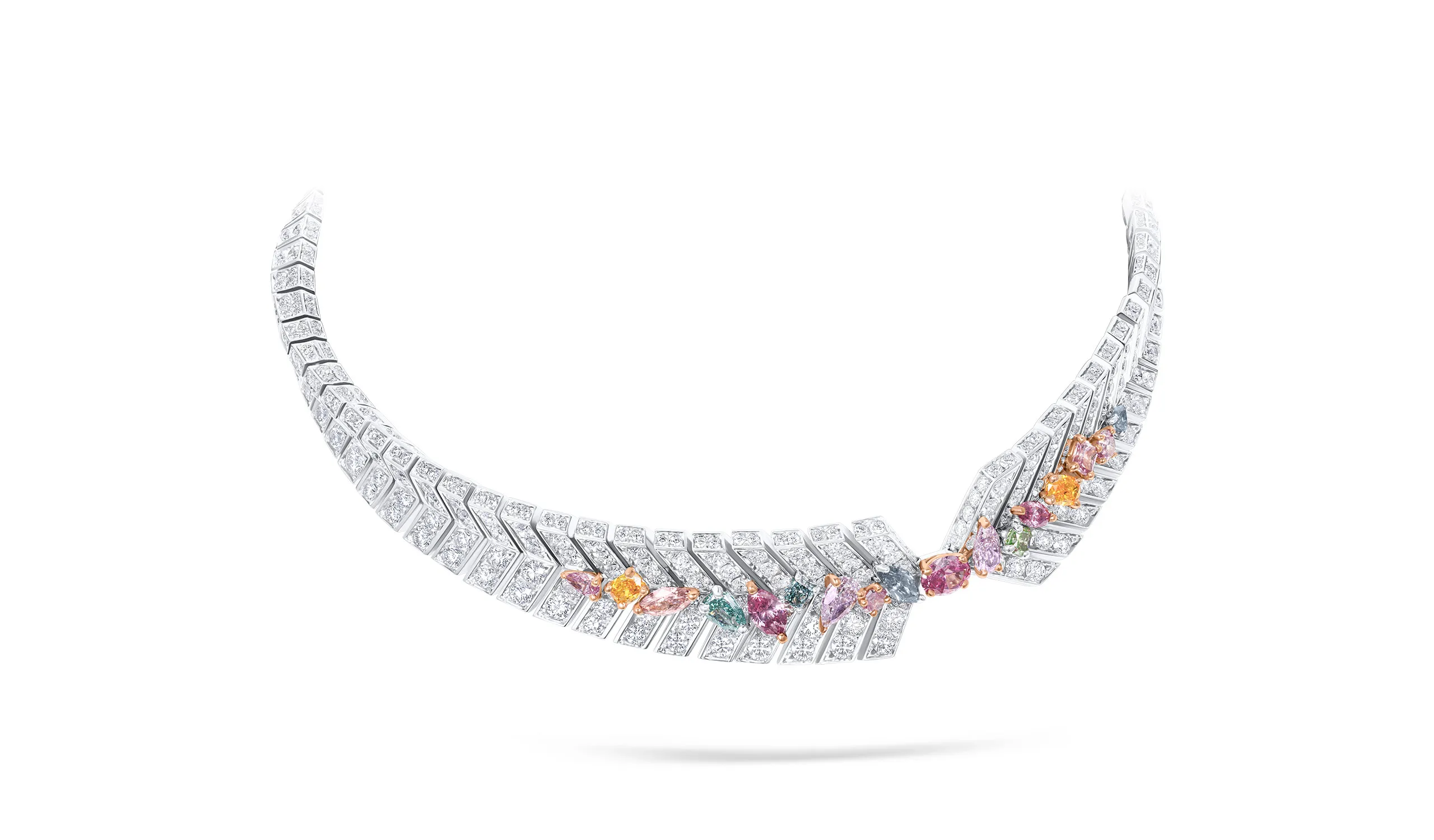 <p>In the Fearne necklace, an unusually broad spectrum of Fancy coloured diamonds is brought together, with blue-greens, deep greens, intense purplish pinks and warm yellowish oranges set side by side</p>
