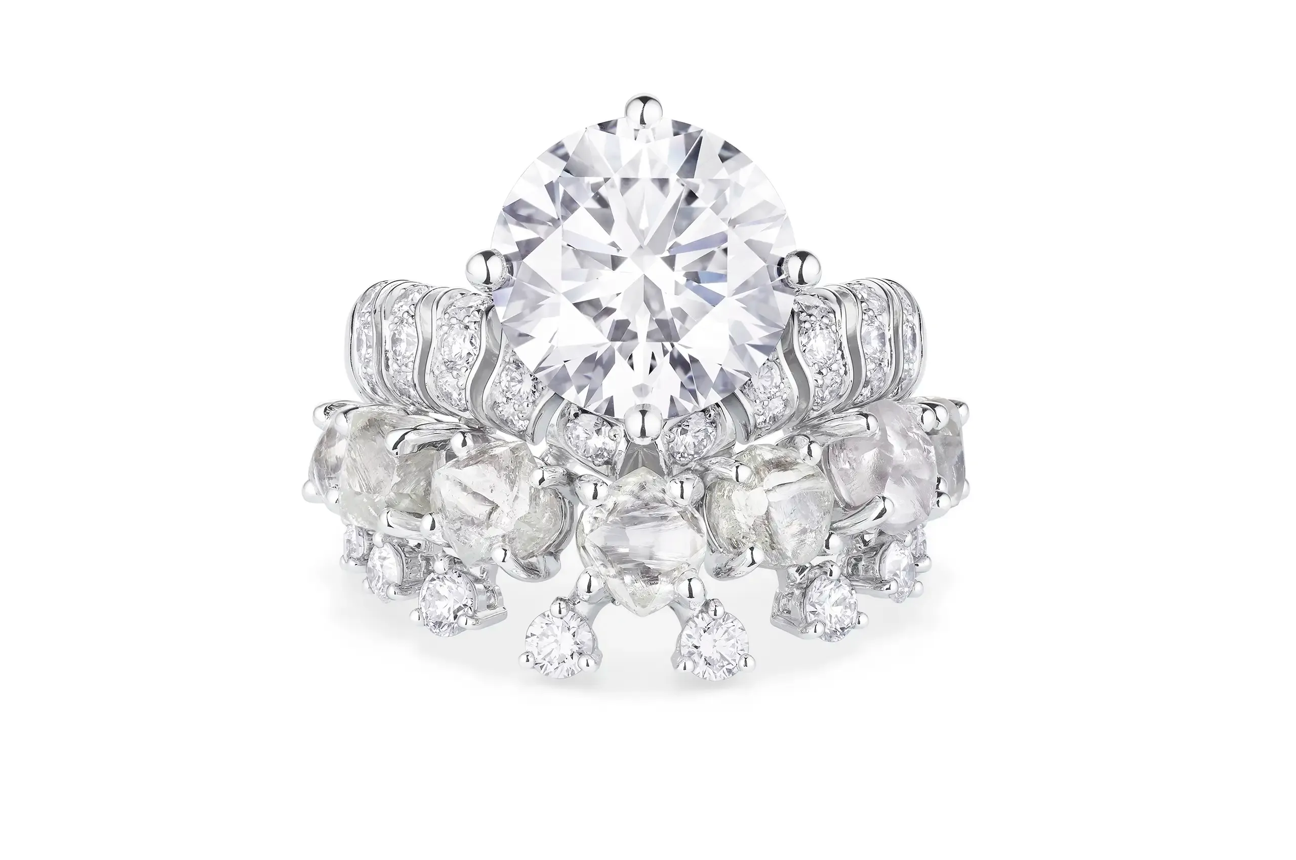 De Beers introduces cabochon cut diamonds to its High Jewellery for the first time, creating a softer glow inspired by droplets resting at the river’s edge.