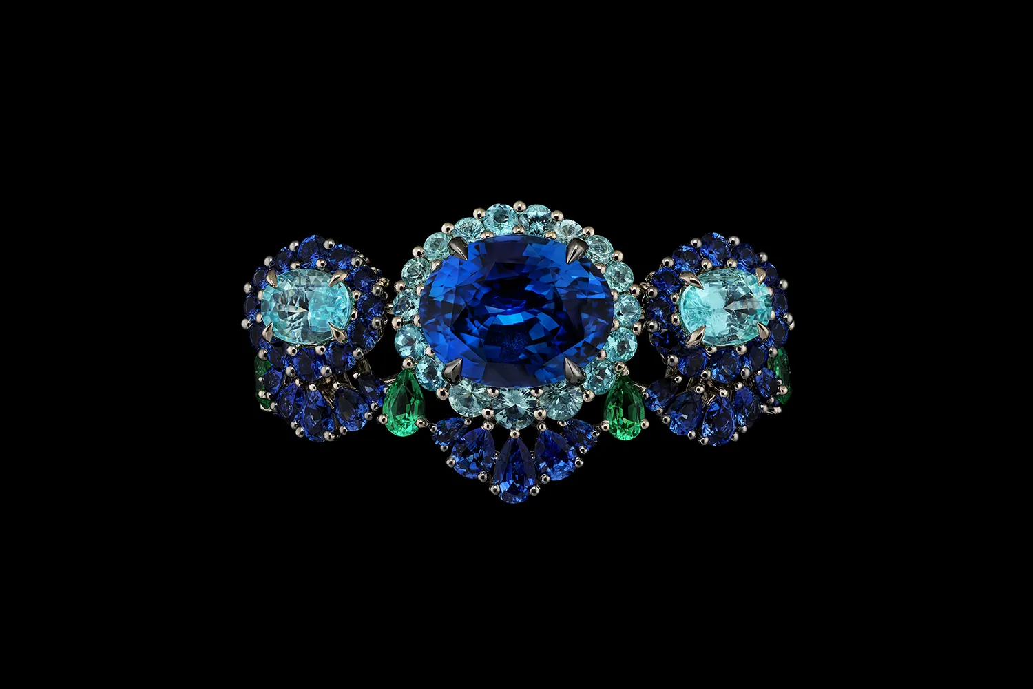 <p>A creation from the Diorexquis High Jewellery collection with a palette of deep blue, sky blue and green gemstones in round, pear and oval shapes </p>