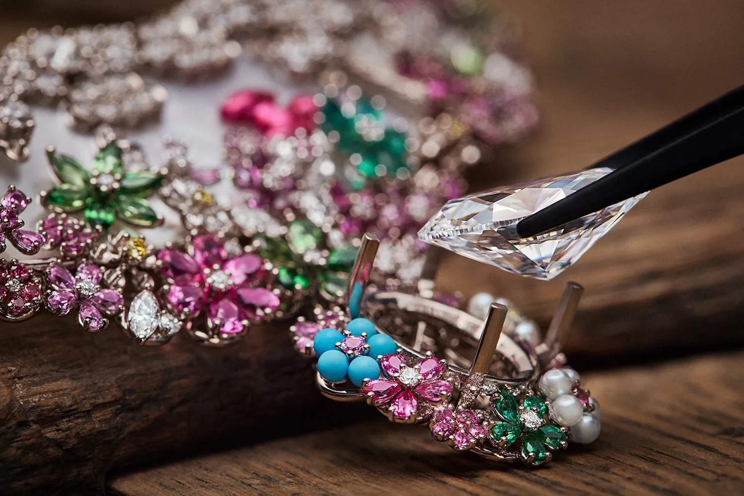 <p>Setting the large oval-shaped diamond at the centre of the Diorexquis Foret Nacrée High Jewellery necklace. Photo credit Piotr Stoklosa</p>