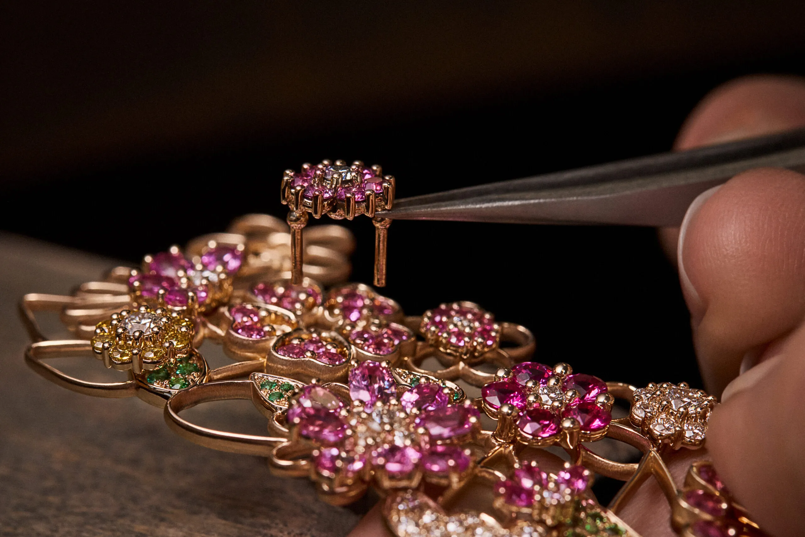 <p>Adding pink sapphire blooms to the Manege Fleuri necklace from the Dior Milly Dentelle High Jewellery collection. Photo credit Piotr Stoklosa</p>