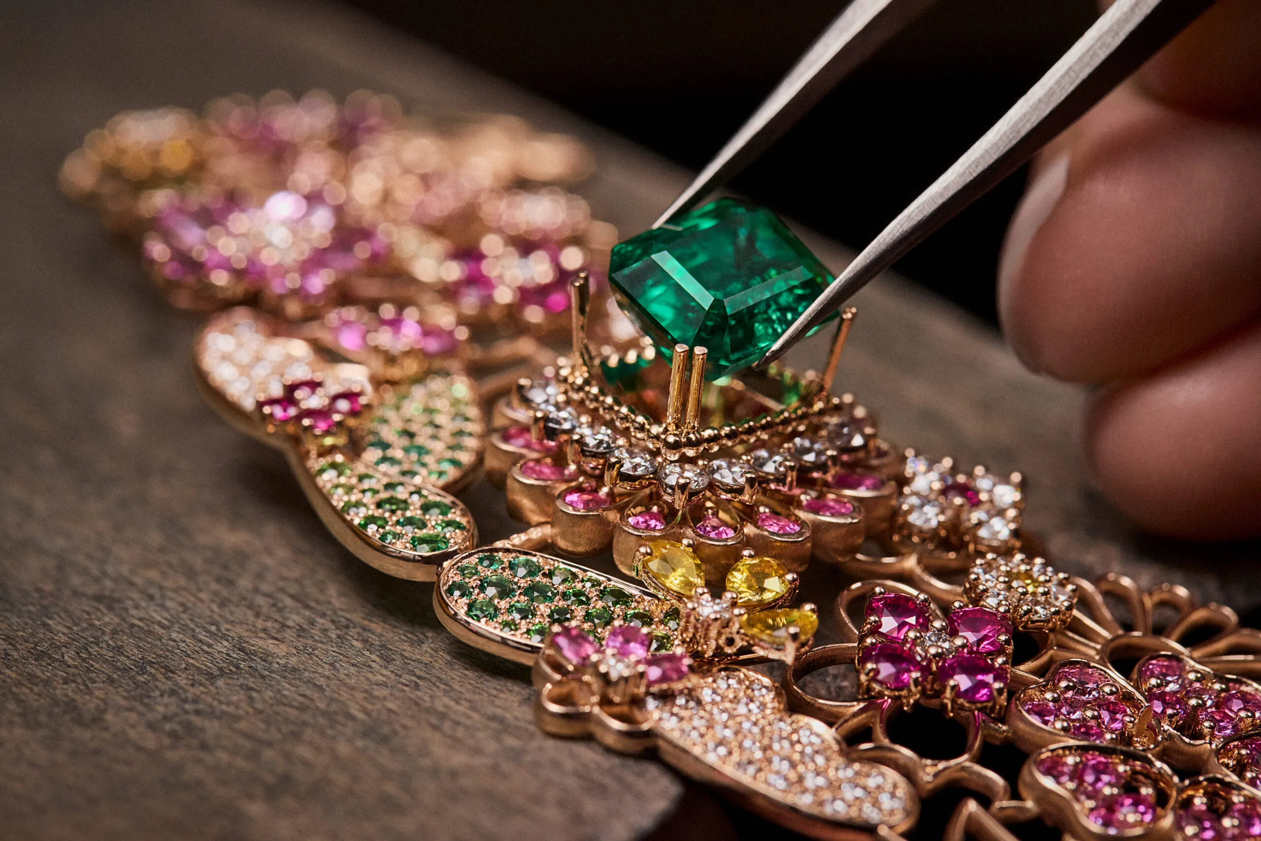 <p>Placing an emerald solitaire in the Manege Fleuri necklace from the Dior Milly Dentelle High Jewellery collection. Photo credit Piotr Stoklosa</p>