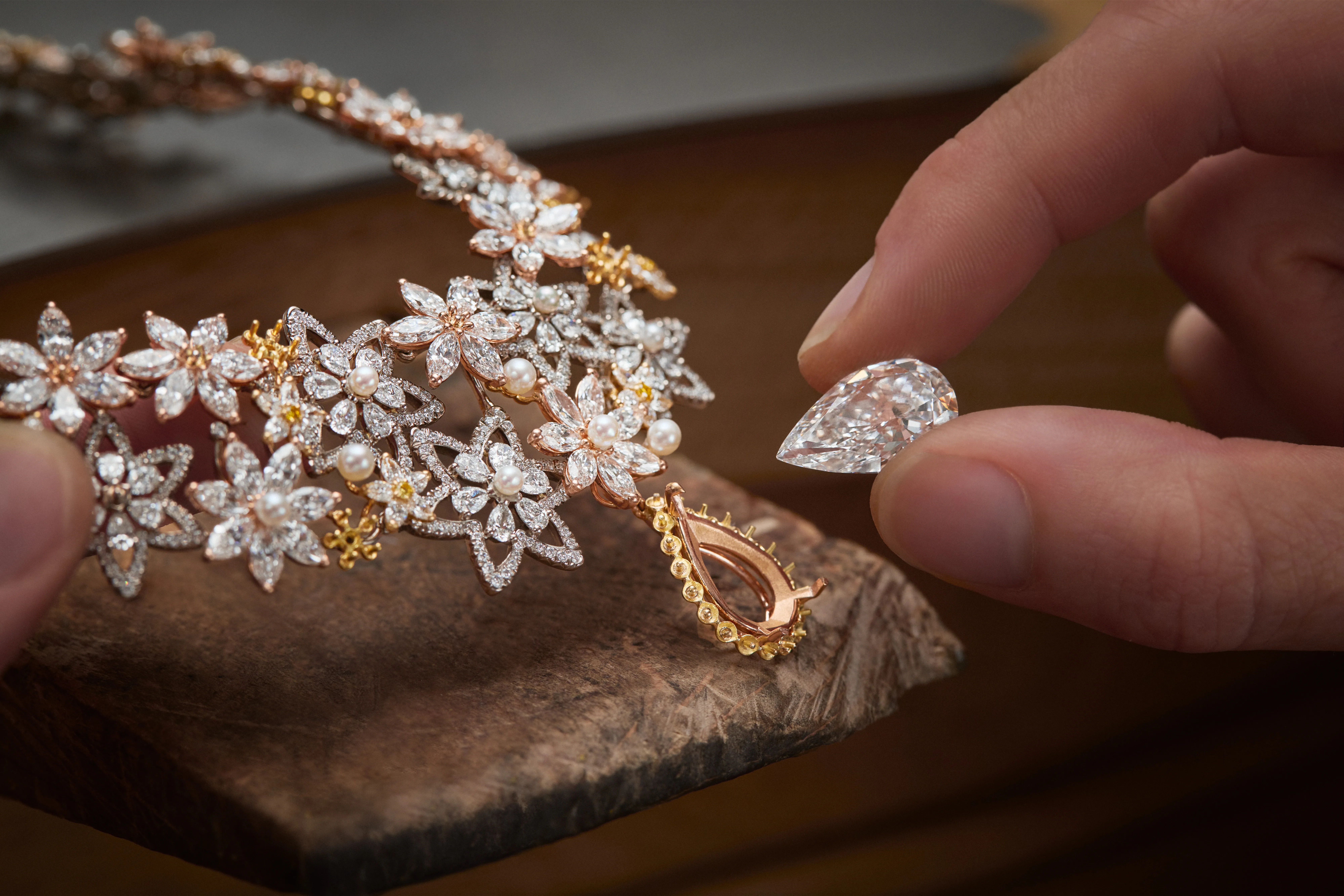<p>A signature necklace from the Dior Milly Dentelle High Jewellery collection is set with a large pear-shaped diamond drop, surrounded by further diamonds and micro-pearls </p>