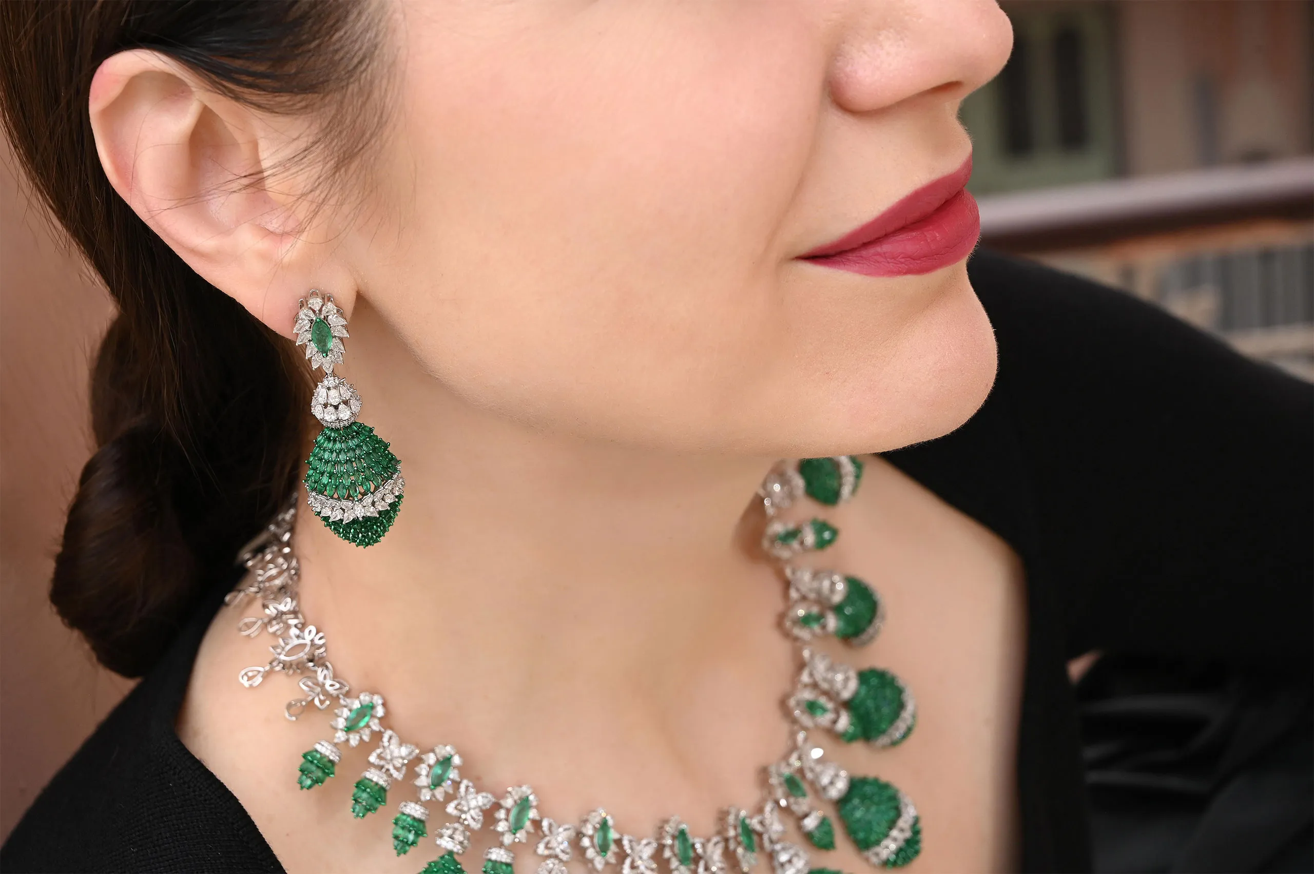 <p>A closer look at the details in a pair of Diviano Plume Collection earrings, set with two-tone marquise-shaped emeralds and fancy-cut diamonds in 18k white gold </p>