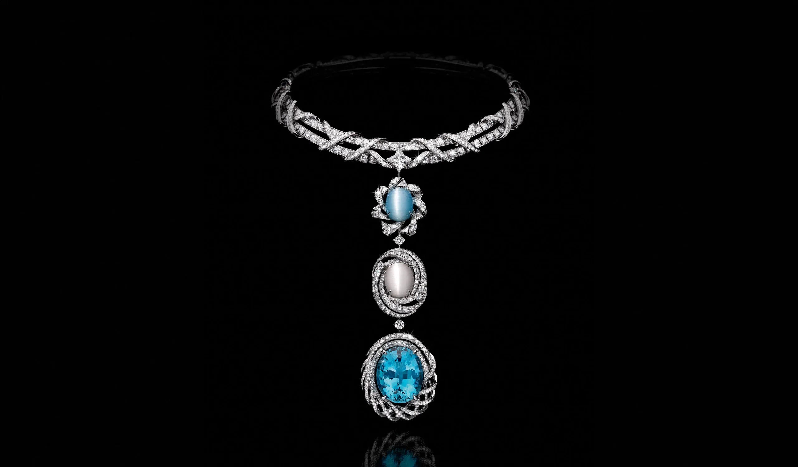 <p>The second Enigma high jewellery necklace reimagines the Damier motif in a rope of gems, set with 52.55ct of aquamarines, two cat’s eye topazes of 29.69 and 27.12 carats and a 3.56ct LV Monogram Star cut diamond</p>
