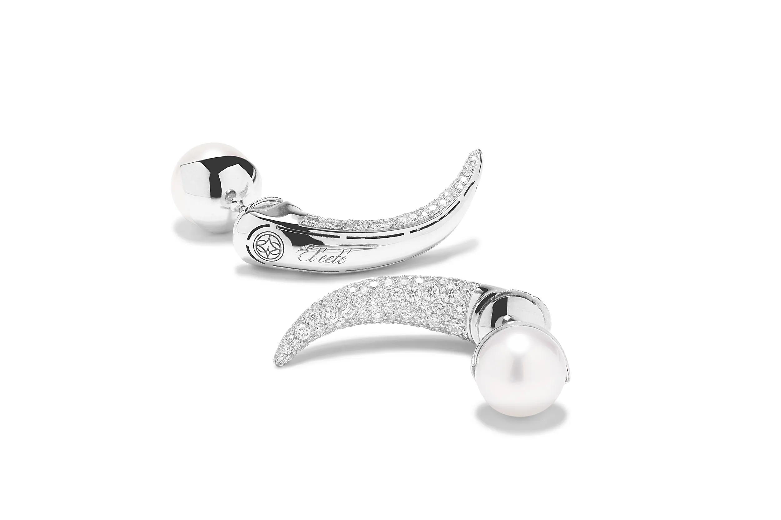 <p>El&#8217;eeté Jewellery South Sea pearl earrings from Collection №1 with 250 brilliant-cut white diamonds and 10mm pearls set in 18k white gold </p>
