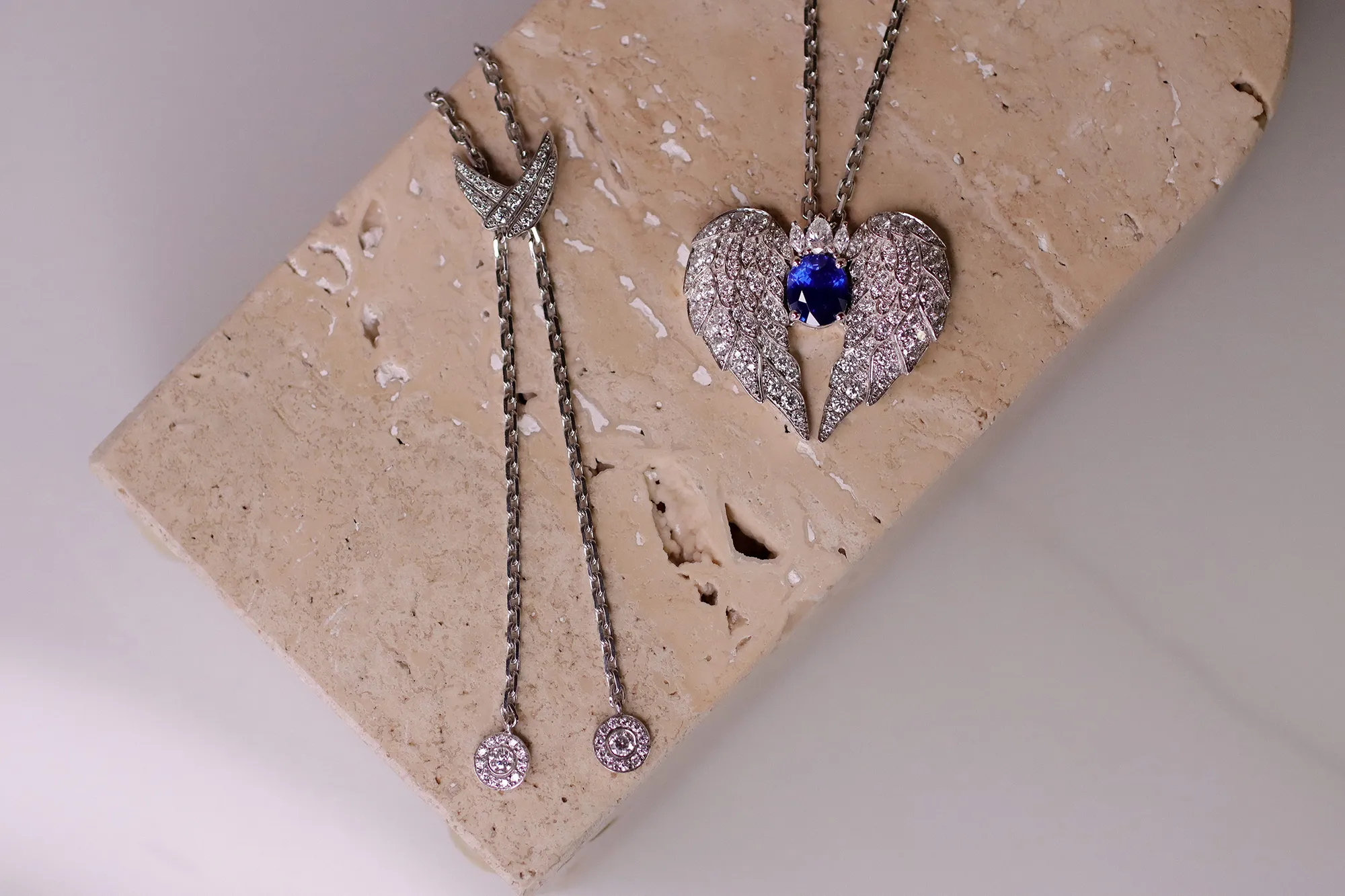 <p>Katerina Perez’s bespoke piece by El&#8217;eeté Jewellery features an oval-shaped sapphire and diamond pendant, as well as diamond-set wing details on the clasp</p>
