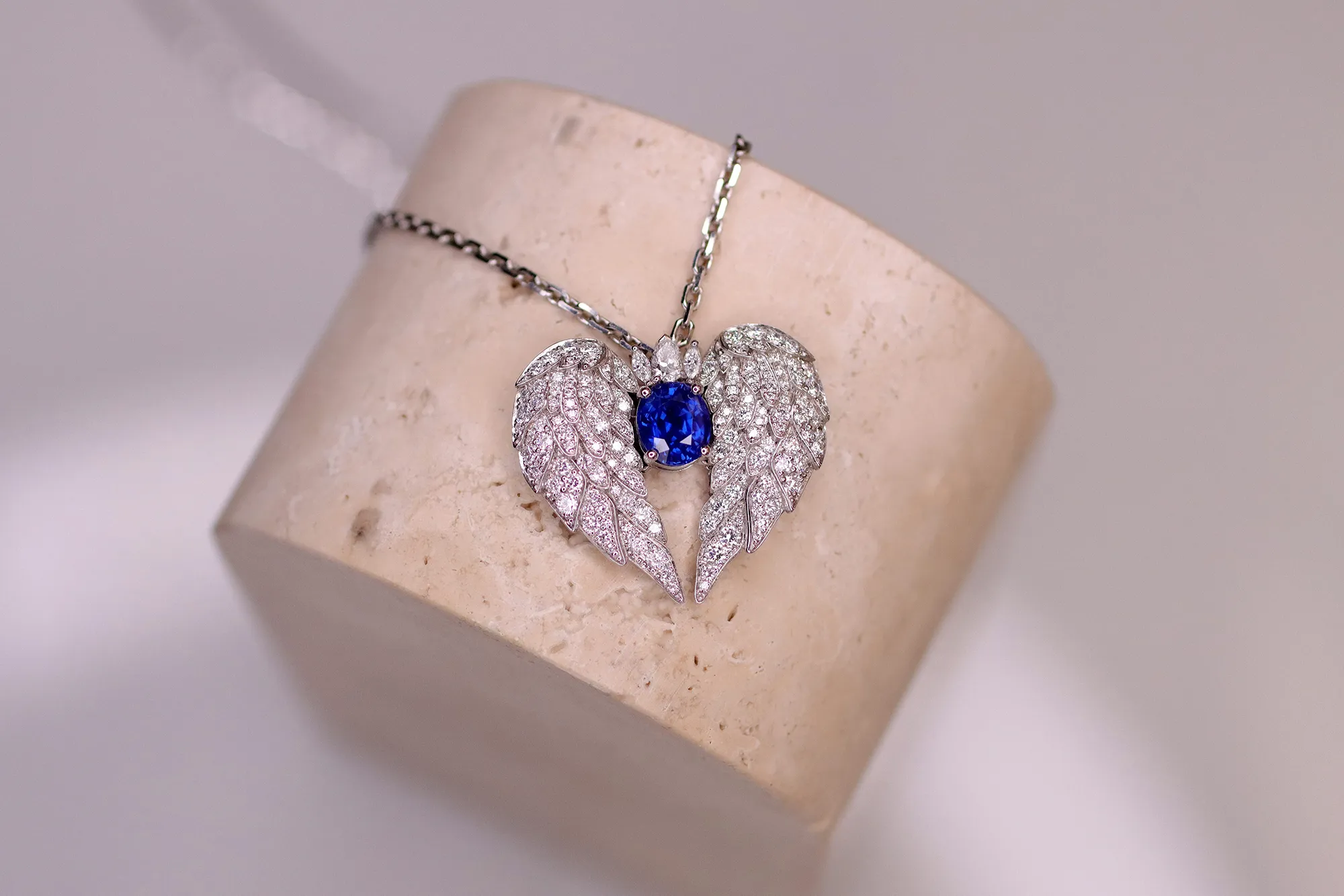<p>The bespoke pendant created by El&#8217;eeté Jewellery for Katerina Perez, including an oval-shaped blue sapphire, round brilliant-cut diamonds and a marquise-cut diamond crown</p>
