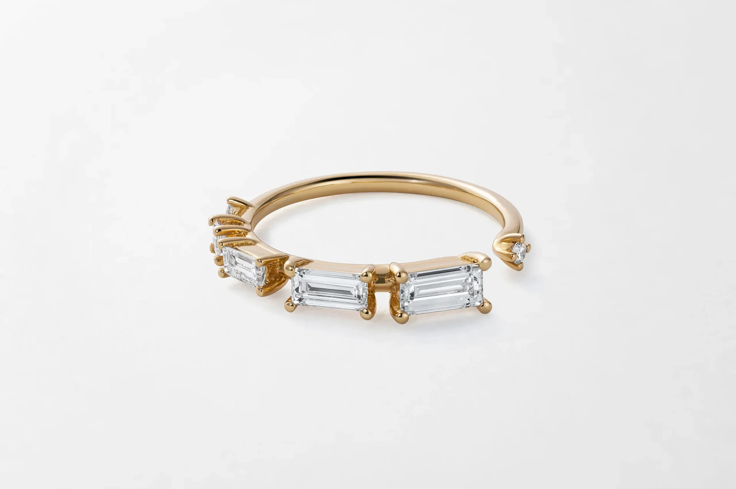 <p>A chic choice for a promise ring, Fernando Jorge’s Ascent diamond ring in 18K yellow gold puts a modern spin on the eternity band.</p>