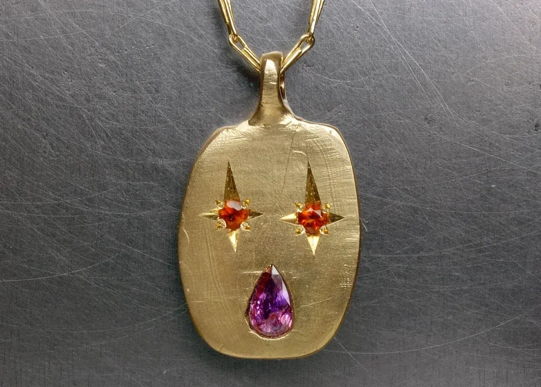 Fraser Hamilton Phantasm pendant in 9K yellow gold with purple and orange sapphires