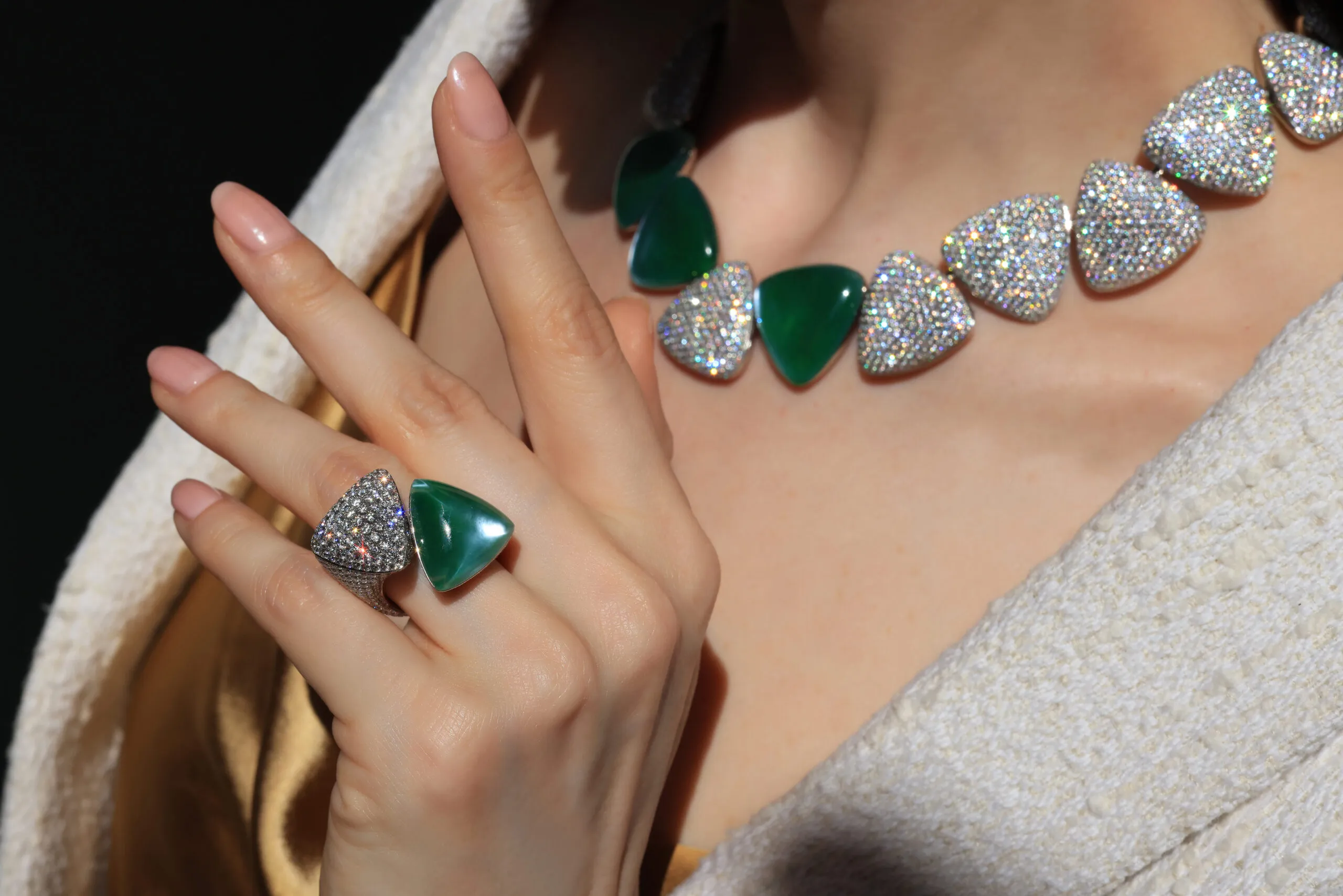 Katerina Perez wears the Vhernier Freccia High Jewellery necklace with jade, rock crystal, mother of pearl and 60.76 carats of diamonds set in white gold, alongside with matching ring with a further 8.24 carats of diamonds 