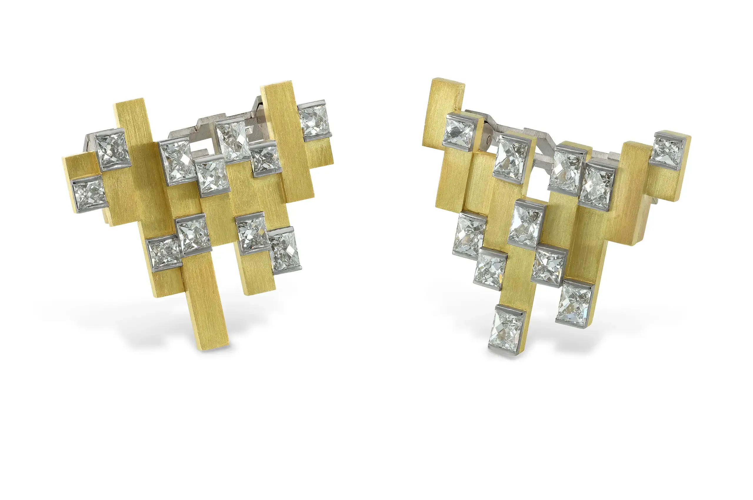 Bold, architectural and highly distinctive, the dress set pairs French cut diamonds with brushed 18ct yellow gold in a design rooted in GRIMA’s modernist style.