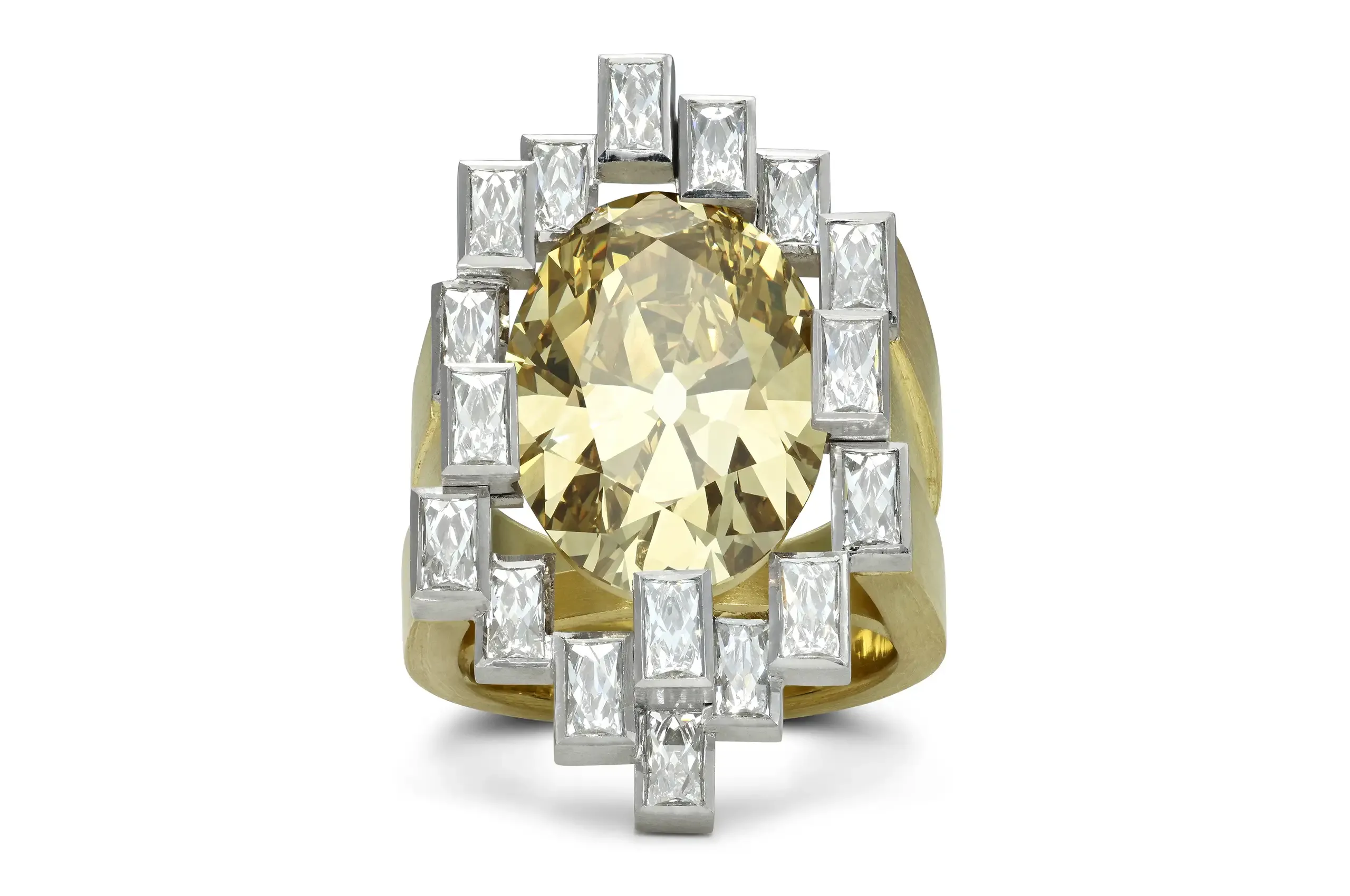 An 11.15 carat cognac old cut diamond sits at the centre of a ring designed without conventional claws and surrounded by French cut diamonds.