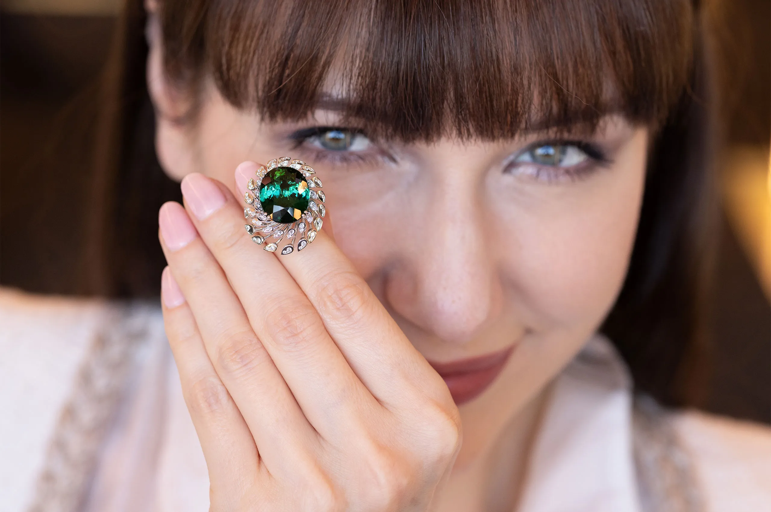 Katerina Perez highlights a ring by Giorgio Visconti featuring a central green tourmaline and diamonds set in white gold 