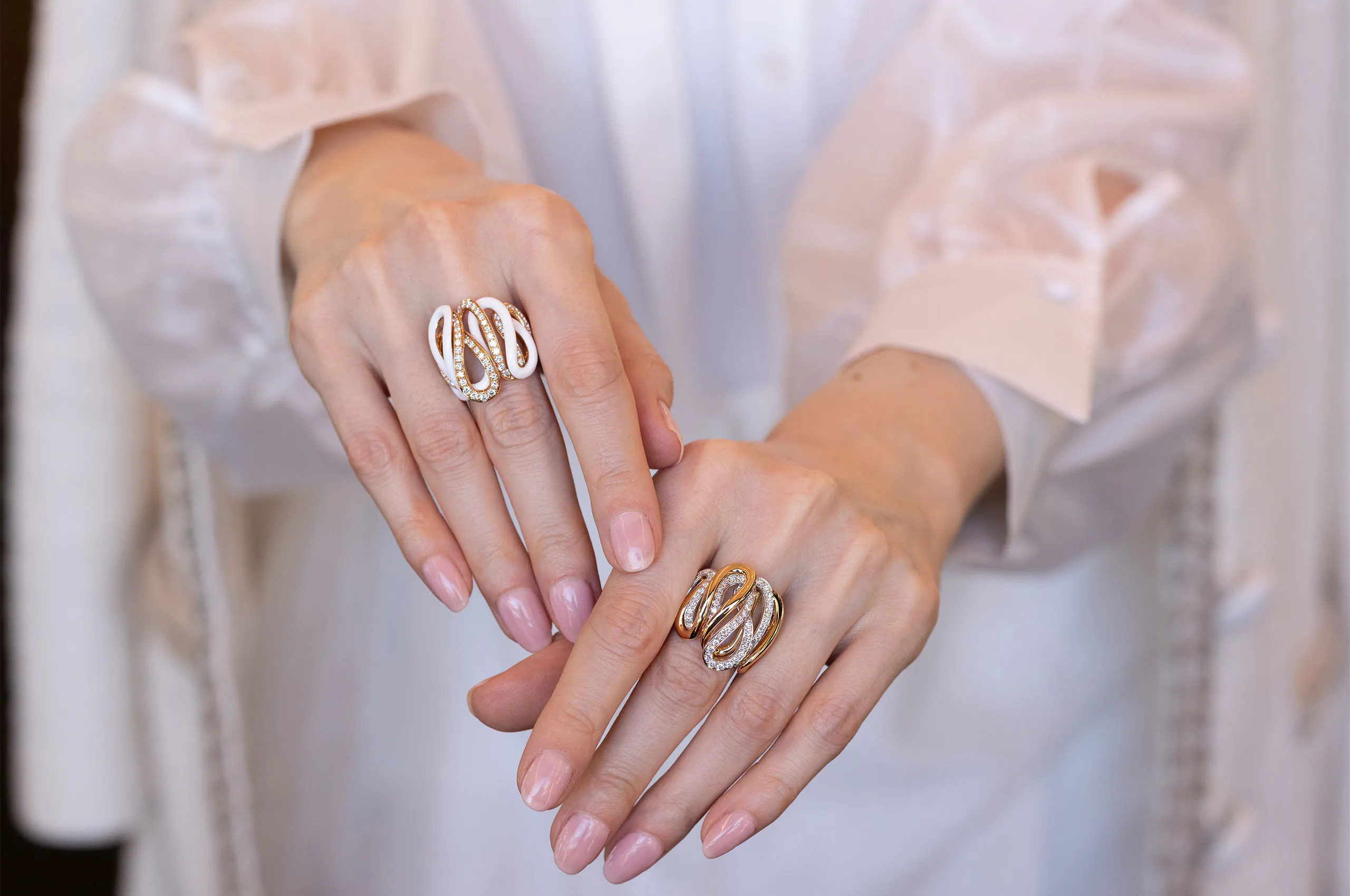 Katerina Perez wears pieces from the Giorgio Visconti Mamba collection, including a ring with diamonds and kogolong in rose gold (left) and a ring with diamonds in rose and white gold 