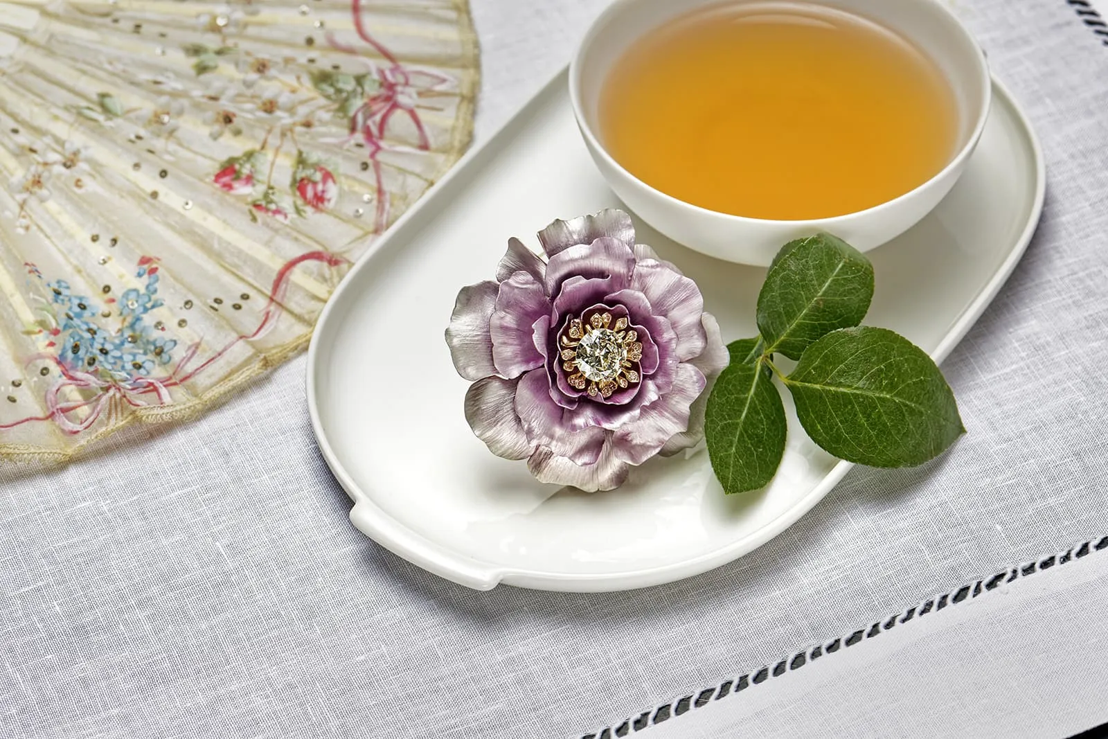 <p>A Hemmerle Rose brooch from the Infused Jewels collection crafted in aluminium, diamonds and white gold</p>