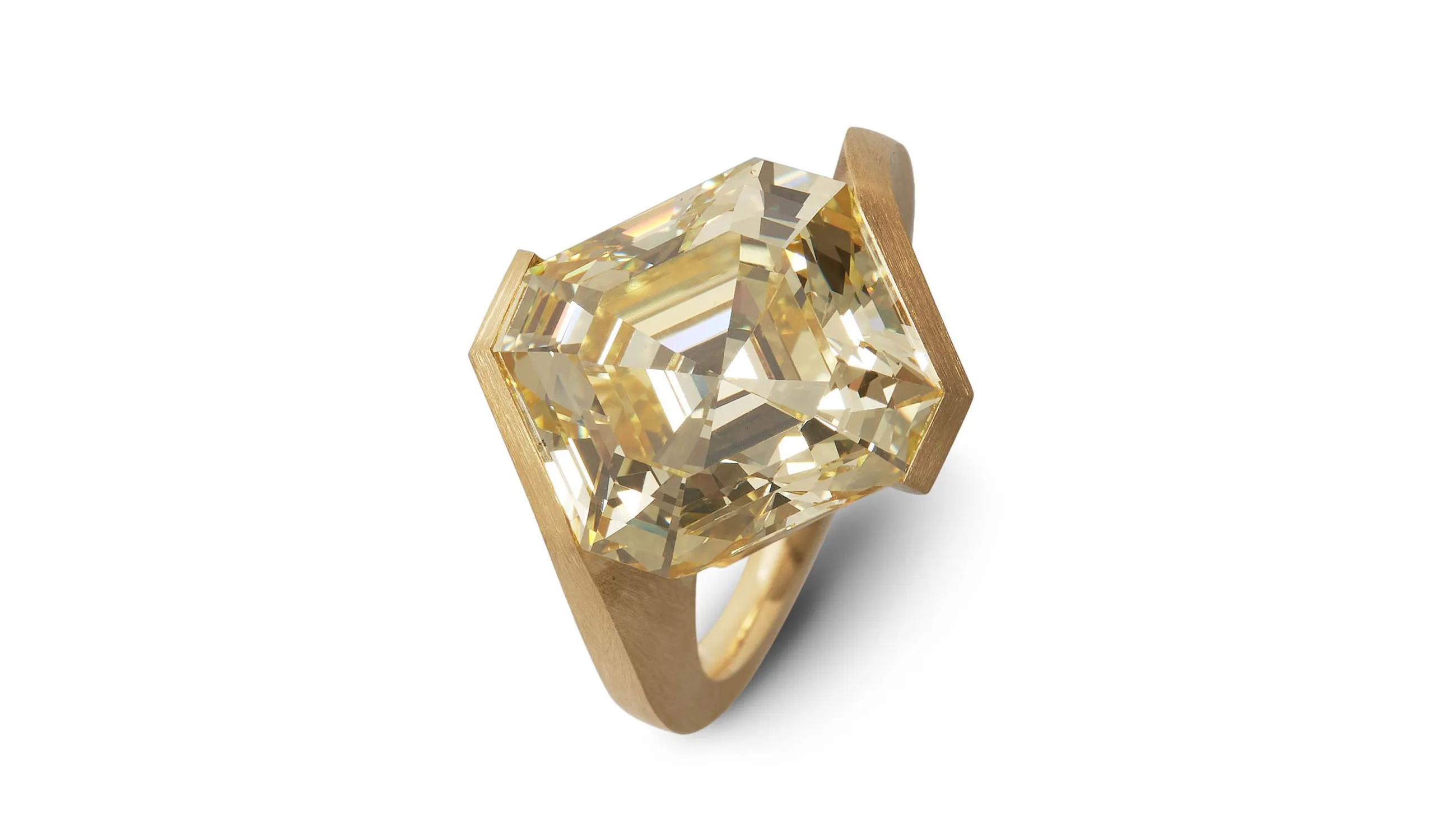 <p>Hemmerle ring featuring a Fancy Intense Yellow diamond set in 18K yellow gold</p>

