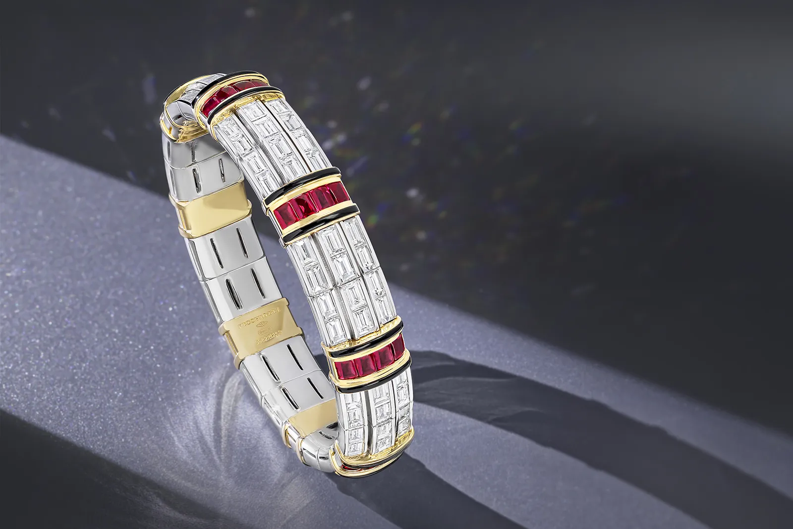 <p>Impeccably Picchiotti Xpandable bracelet from the Picchiotti Classics collection with 32 buff top Burmese rubies totalling 8.80 carats, 18.88 carats of diamonds and onyx inlay set in 18k white and yellow gold</p>
