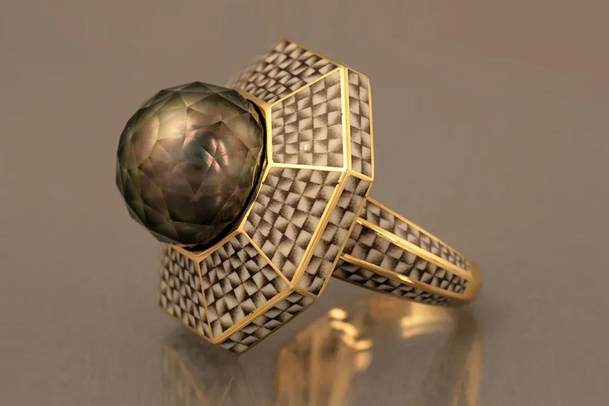 <p>Ilgiz F. enamel ring with a Tahitian pearl faceted by Viktor Tuzlukov</p>