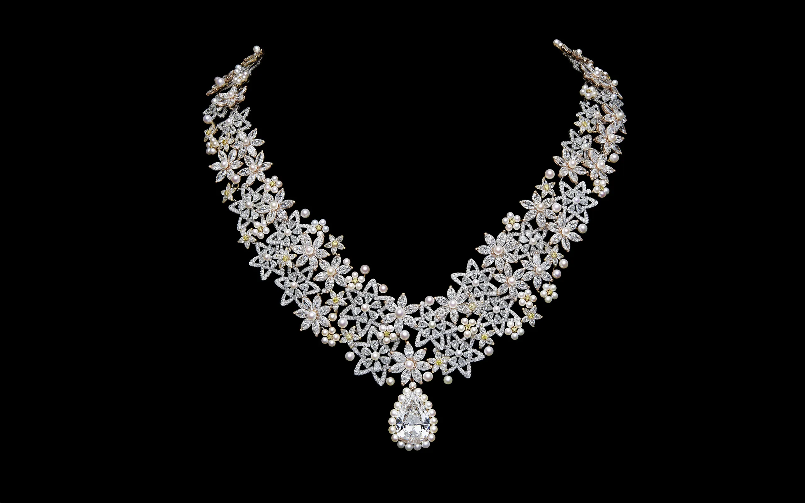 <p>One of the highlights of the Dior Milly Dentelle High Jewellery collection – a necklace with a pear-shaped diamond drop, round brilliant-cut diamonds, further pear-shaped diamonds, yellow gemstones and micro-pearls in 18k gold </p>