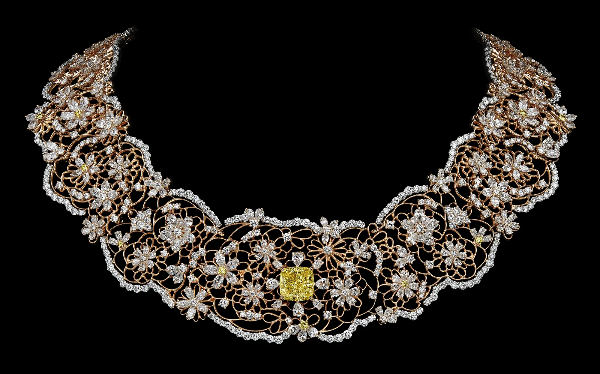 <p>A necklace with a large yellow diamond, further yellow diamonds, and colourless diamonds in a lace-like openwork structure from the Dior Milly Dentelle High Jewellery collection</p>