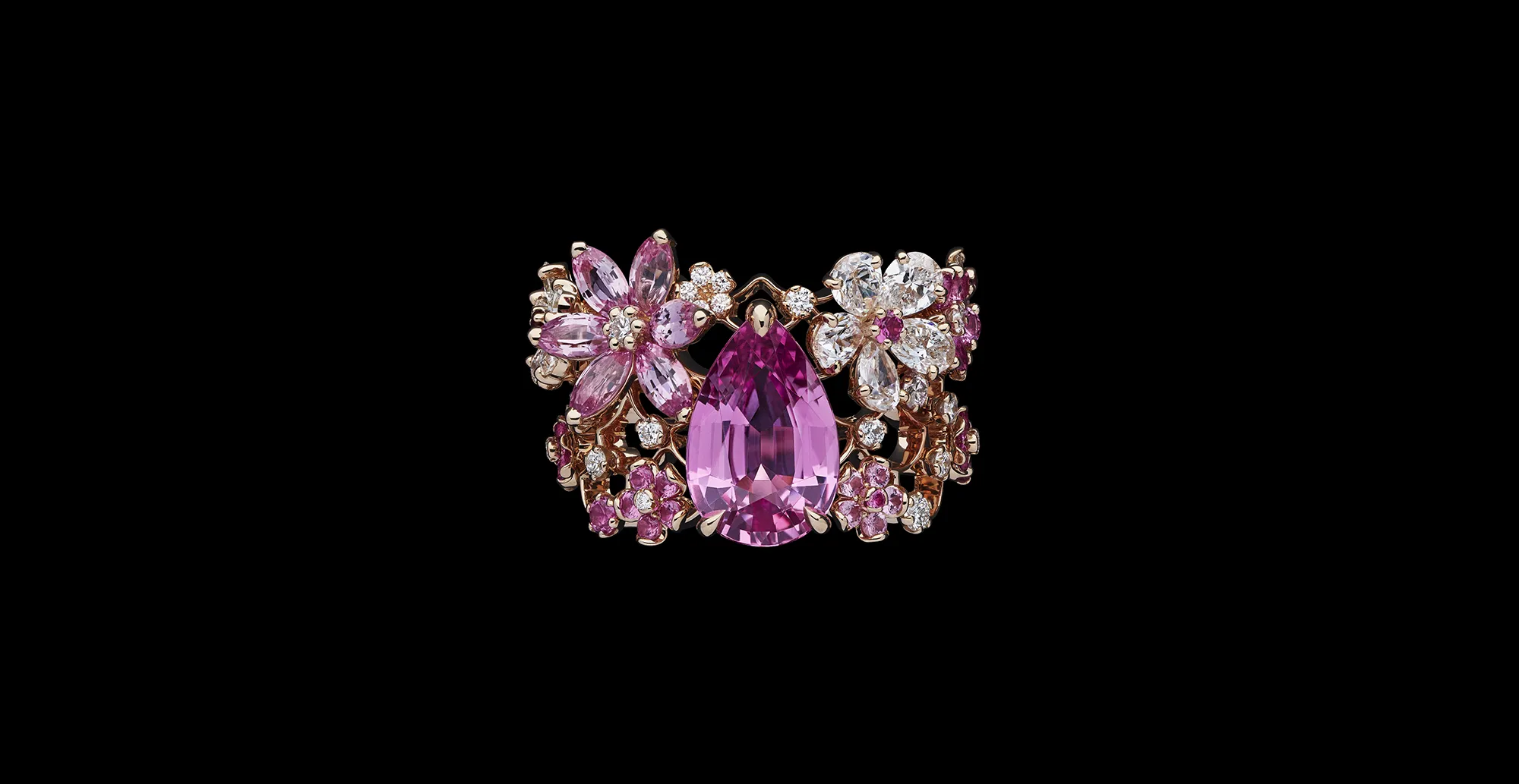 <p>A ring with a large pear-shaped pink sapphire, marquise-shaped pink sapphires and diamonds from the Dior Milly Dentelle High Jewellery collection</p>
