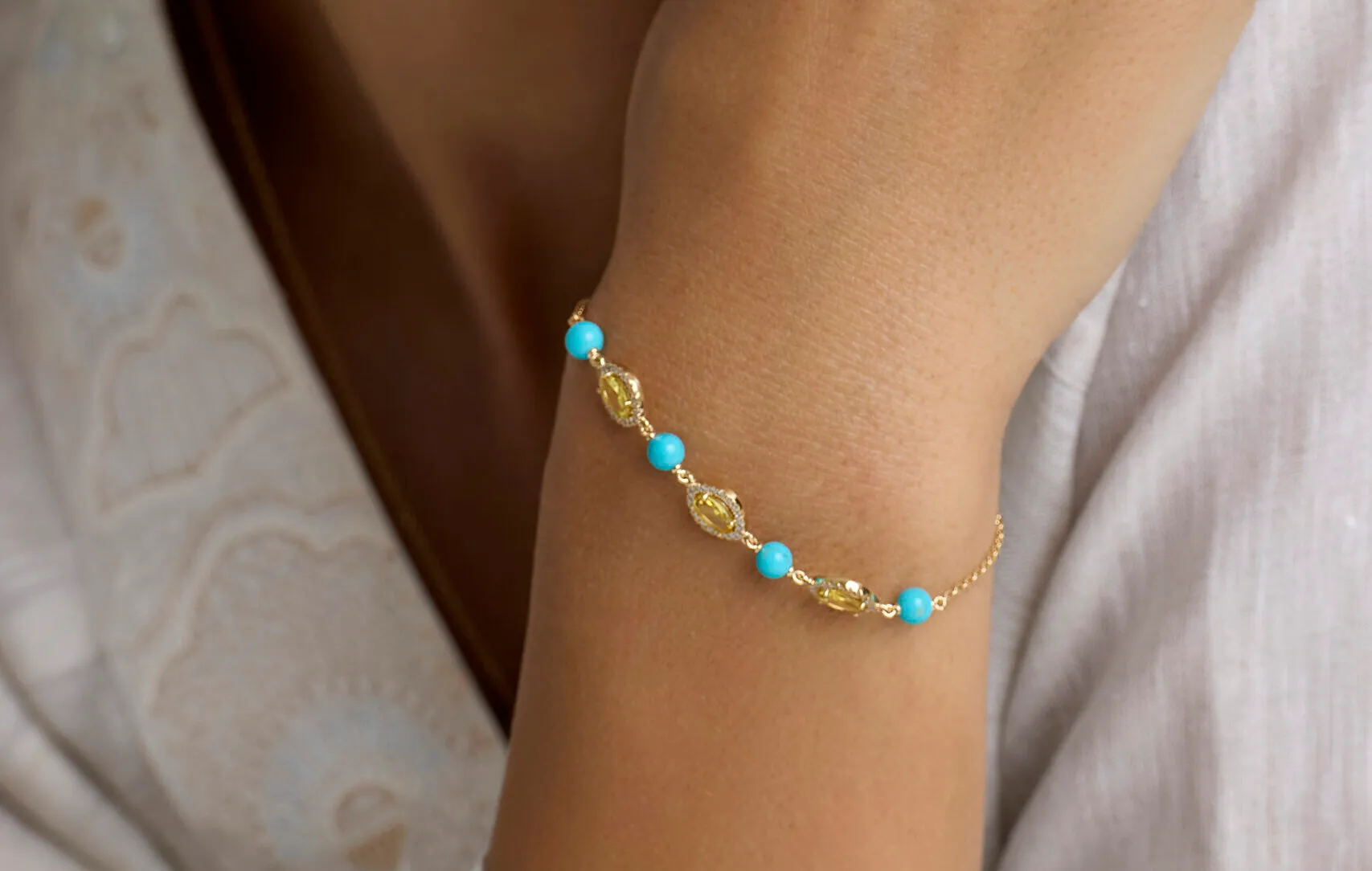 <p>Gyan Jaipur bracelet from the Jaipur collection with yellow sapphire, diamond and turquoise in 18k yellow gold </p>

