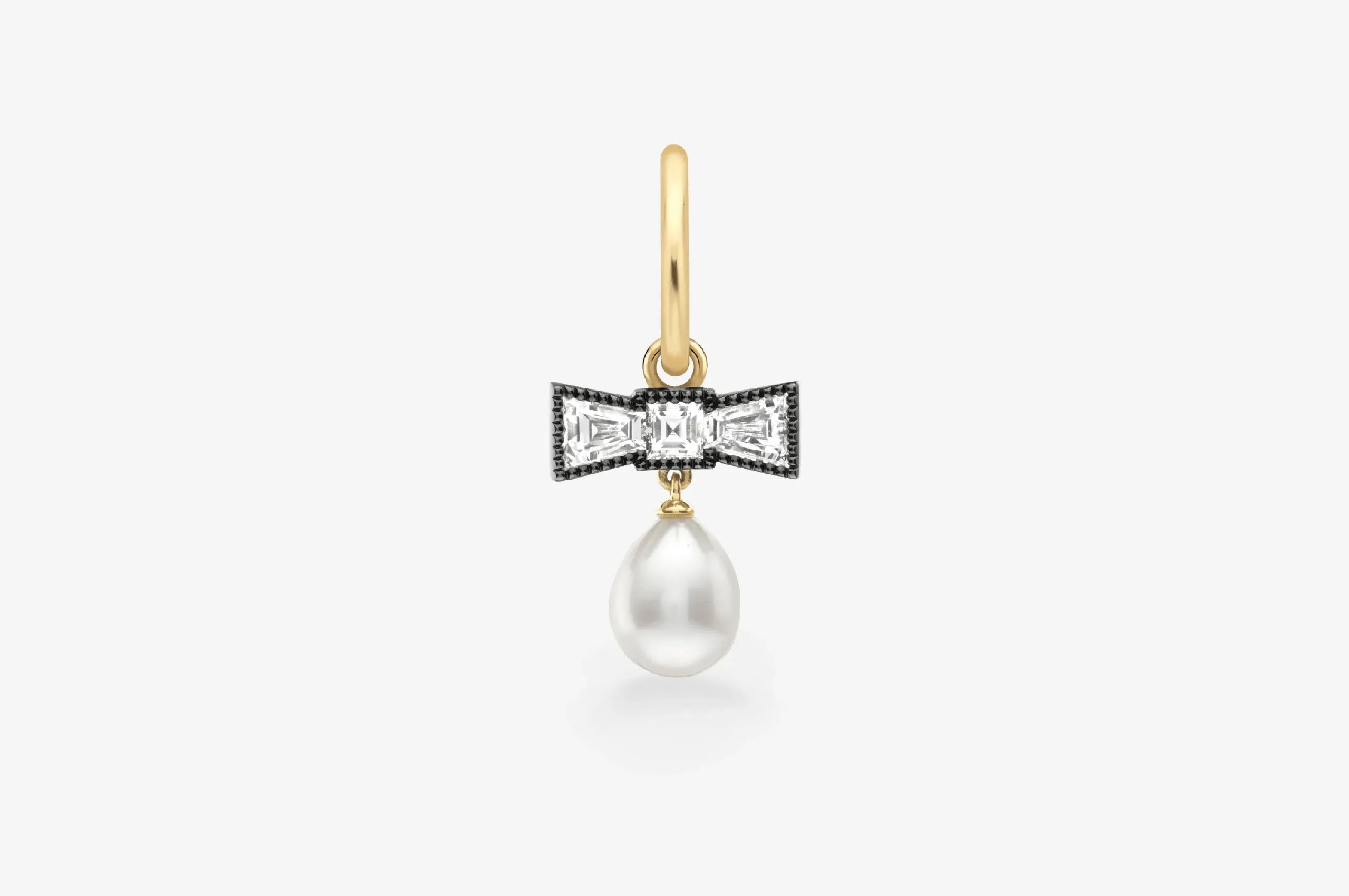 Across 21 pieces, bows are pulled apart, stretched, looped and sculpted into forms that feel far removed from the traditional ribbon.