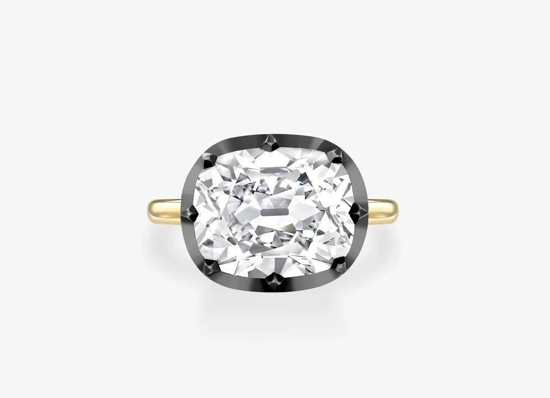 <p>Jessica McCormack 6.27 carat East-West cushion cut diamond Button Back engagement ring in 18K white and yellow gold</p>
