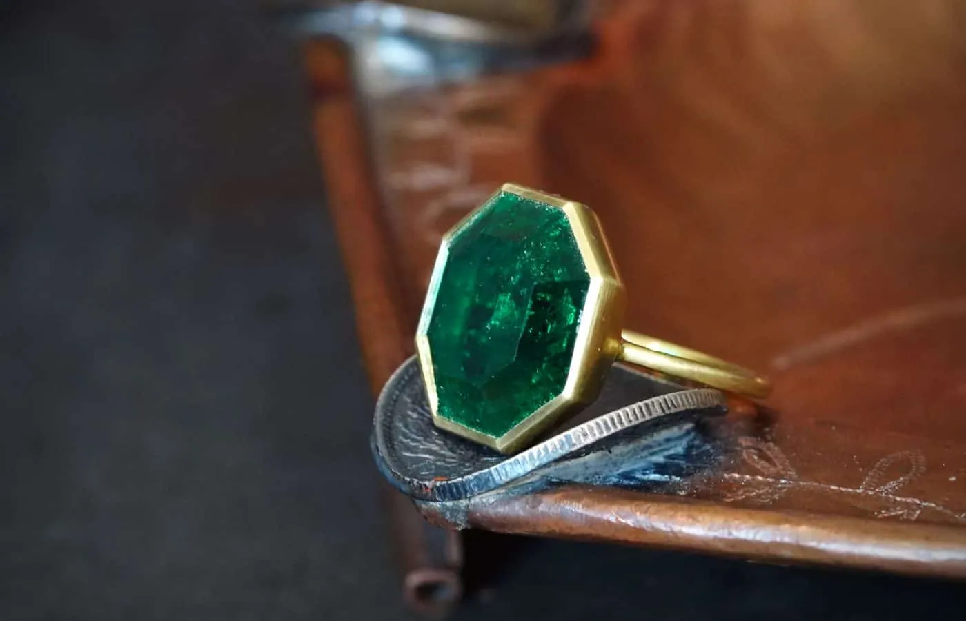<p> Jogani ring with a 10.97 carat step-cut Colombian emerald in 20k gold </p>