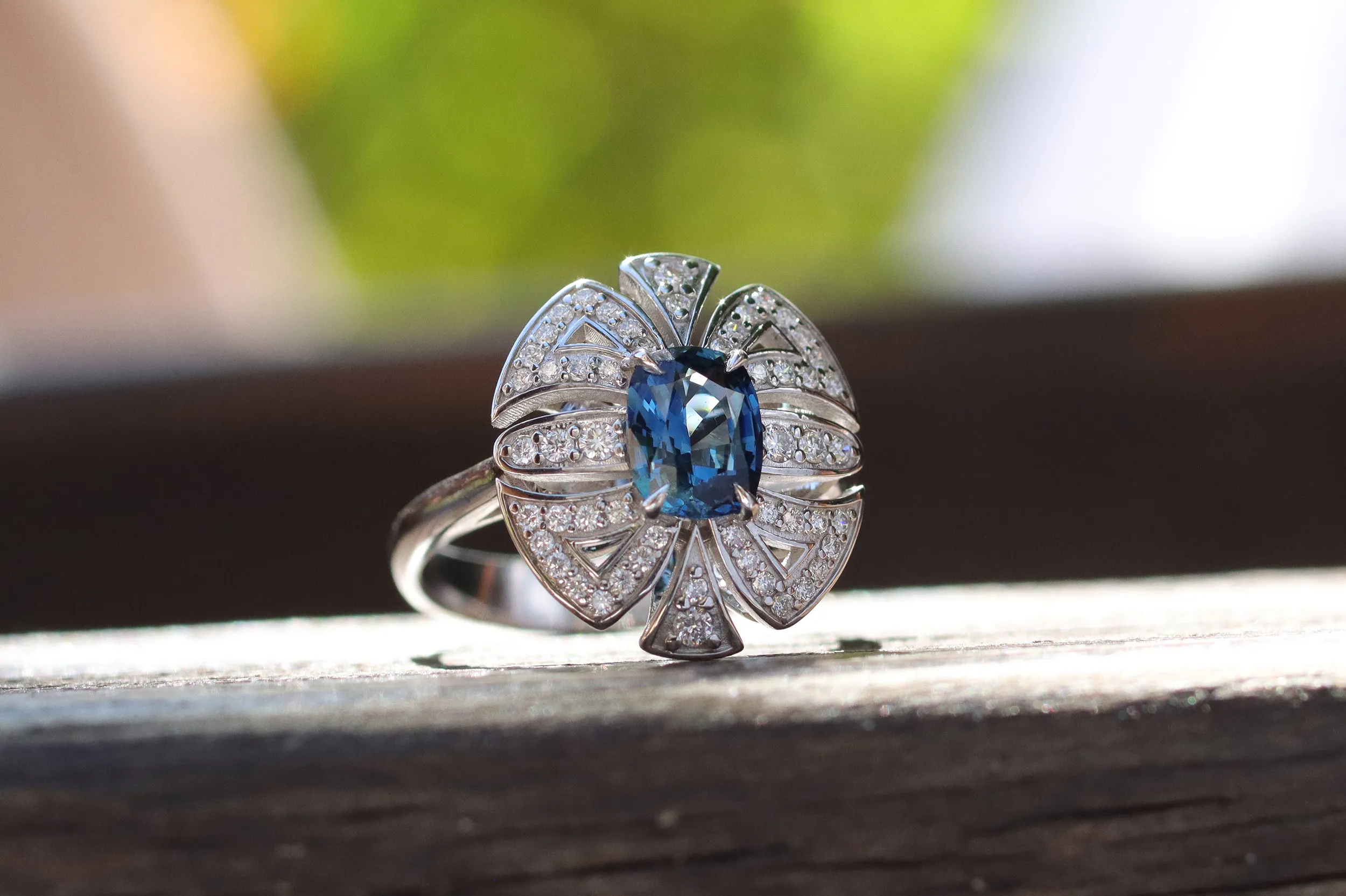 <p>Morebelli ring with a 1.22 carat blue sapphire from Ilakaka, Madagascar, surrounded by 54 diamonds with a total weight of 0.31 carats, set in 18k white gold </p>