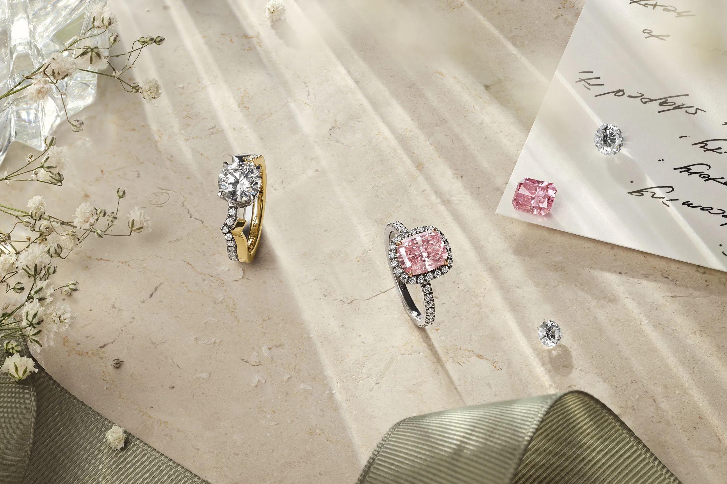 <p>Signature rings by Cherituelle, including the Jeri Lunaire ring in 18k yellow and white gold (left) and the Aurora ring with a fancy pink laboratory-grown diamond in 18k white gold</p>