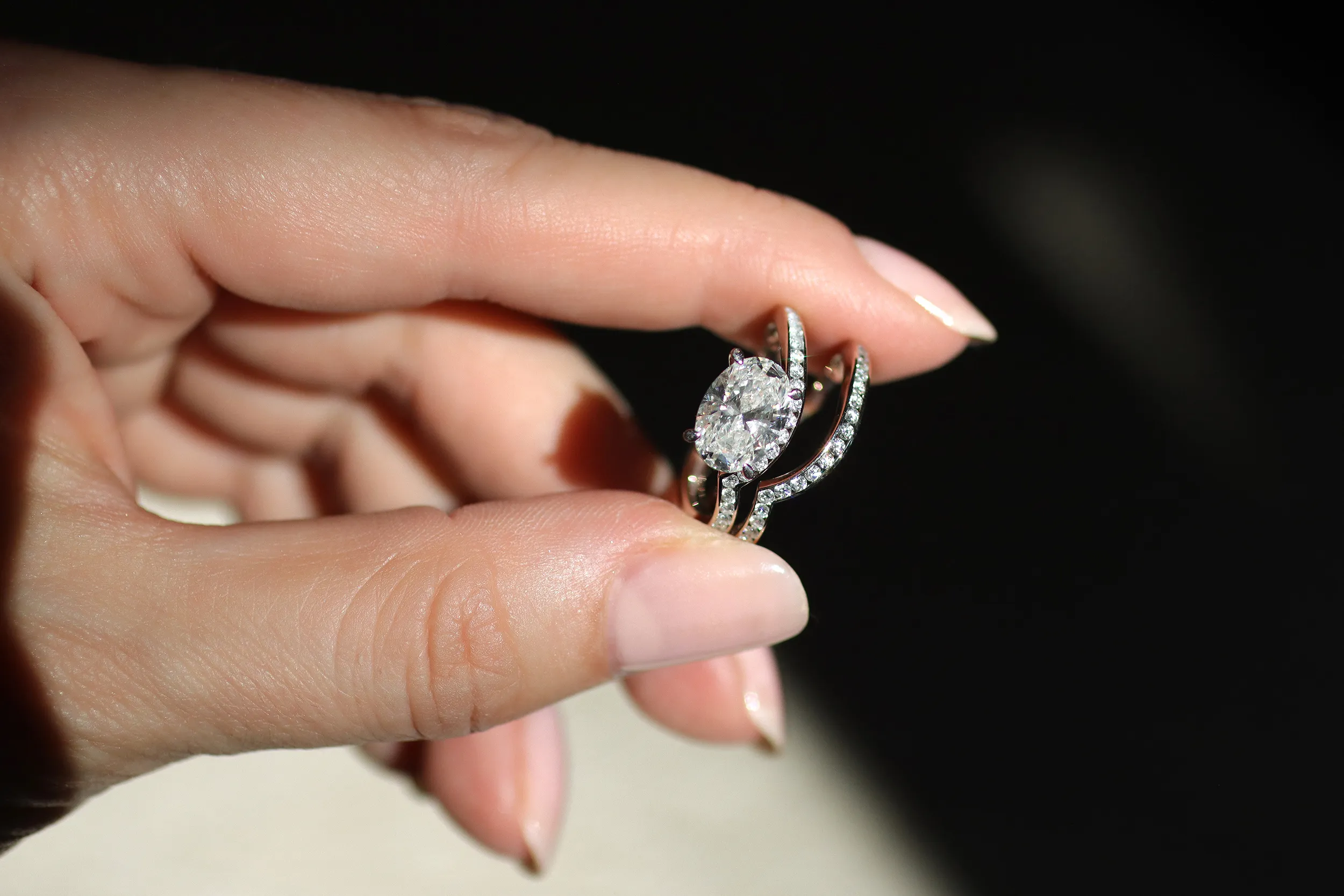 <p>The Cherituelle Jeri Radiante ring with an oval-shaped laboratory-grown diamond, pictured alongside a second Jeri ring with full laboratory-grown diamond pavé in 18k white gold</p>