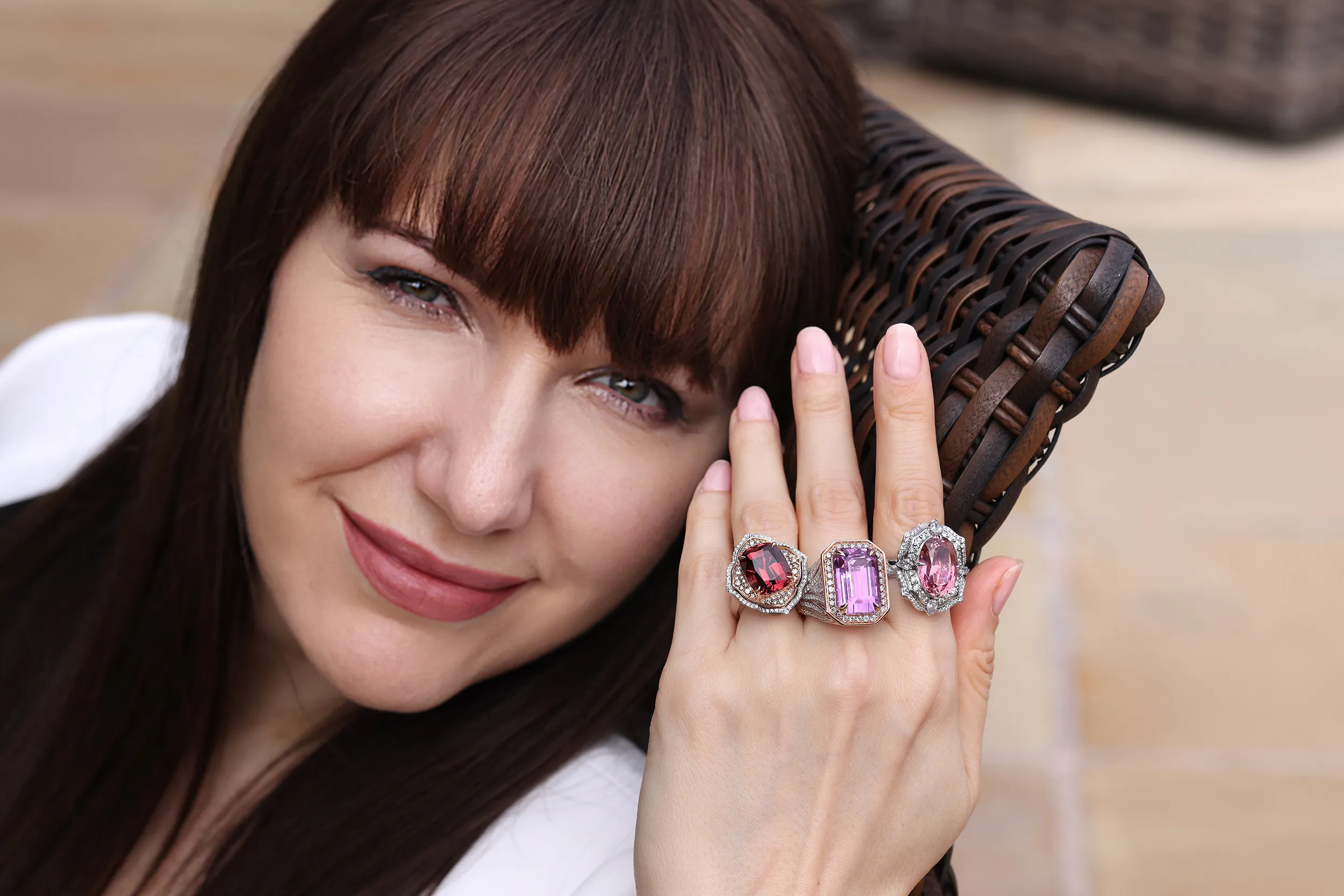 <p>A handful of Chromia&#8217;s rare and exotic gemstones: a 20.52ct emerald cut Mawi kunzite; a 9.19ct cushion cut titanium tourmaline; and a 9.42ct oval titanium tourmaline</p>
