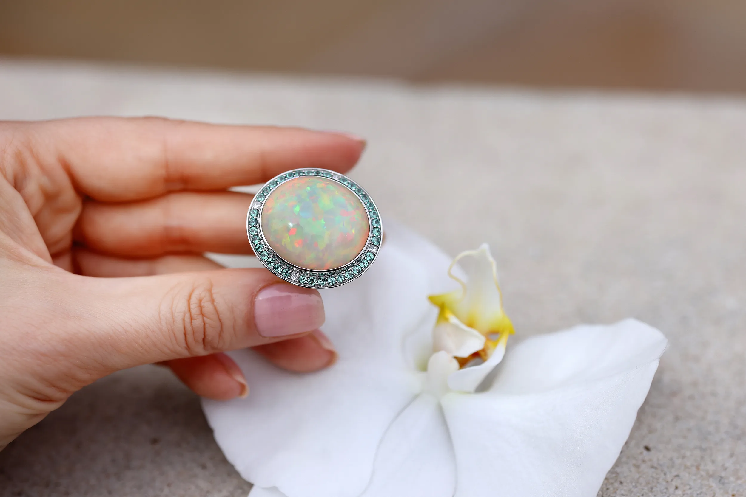 Katerina Perez and Amit Bhansali, founder of Chromia_Chromia sits on its rough Ethiopian Welo opal for 12 months before carving to ensure stability and quality of colour