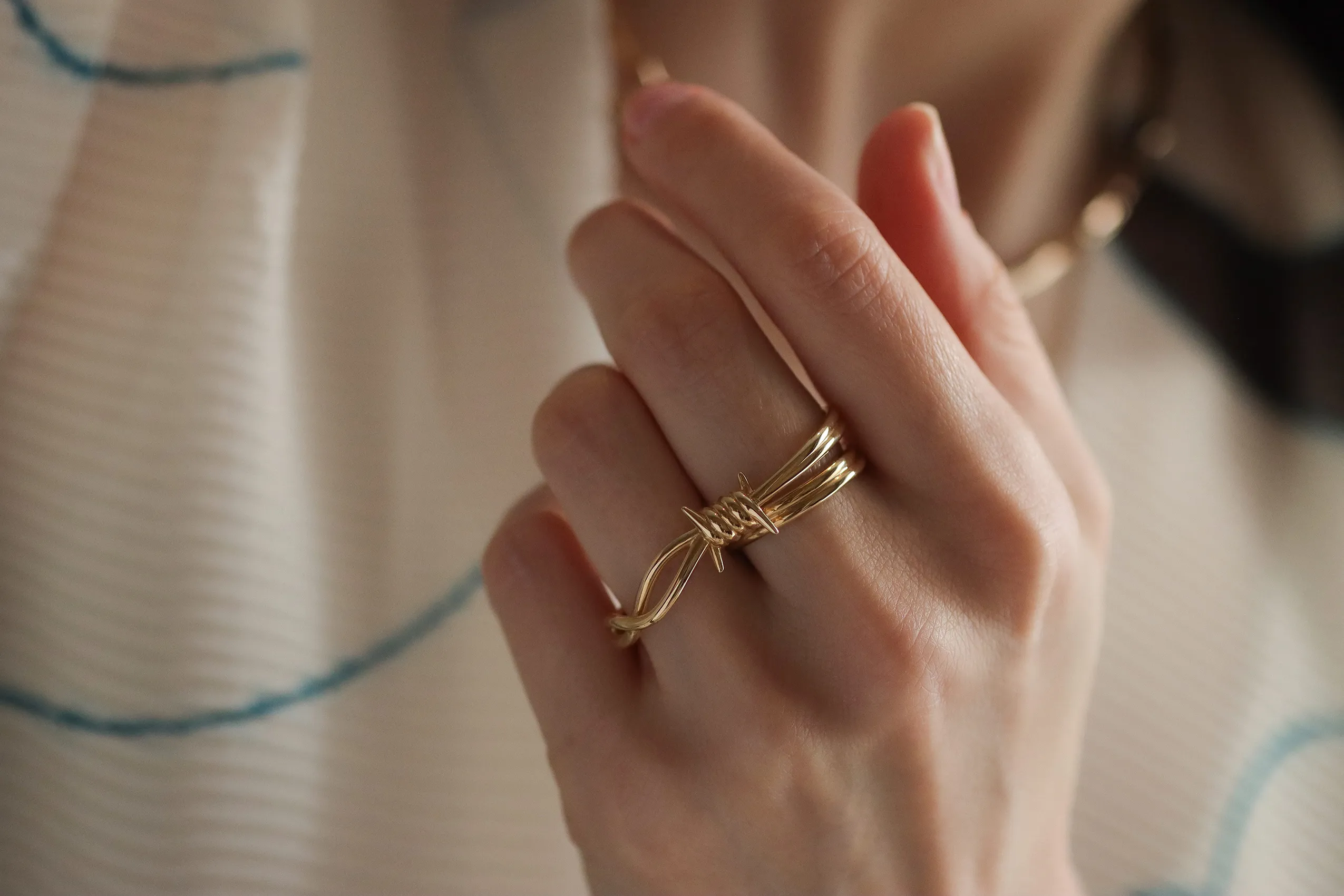 <p>The two-finger Wethaq ring in 18k yellow gold. “These are pieces that protect, even when they look spiky,” says Dalal Alosaimi, founder of Moody Jewellery</p>