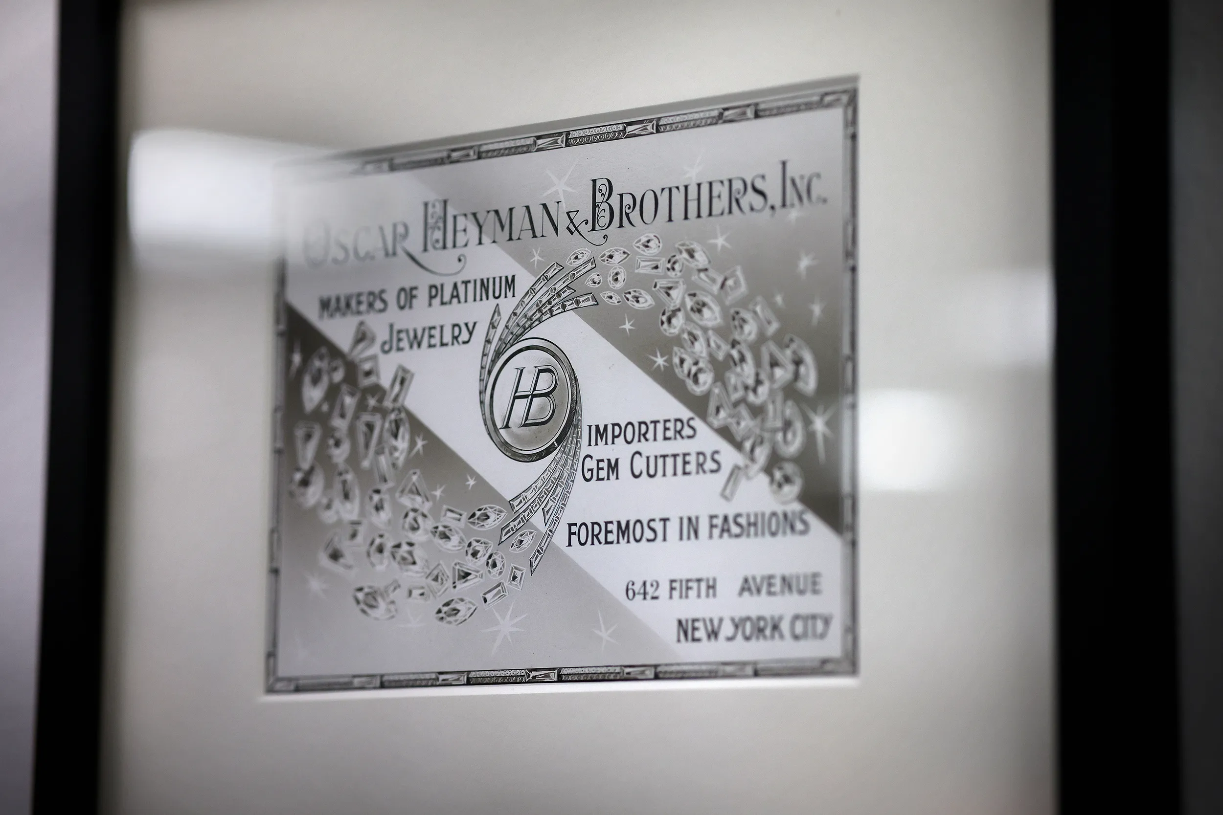 <p>Advertisements dating back to the mid 1900s line the walls of the office, a reminder of the brand&#8217;s deep roots in the jewelry industry</p>

